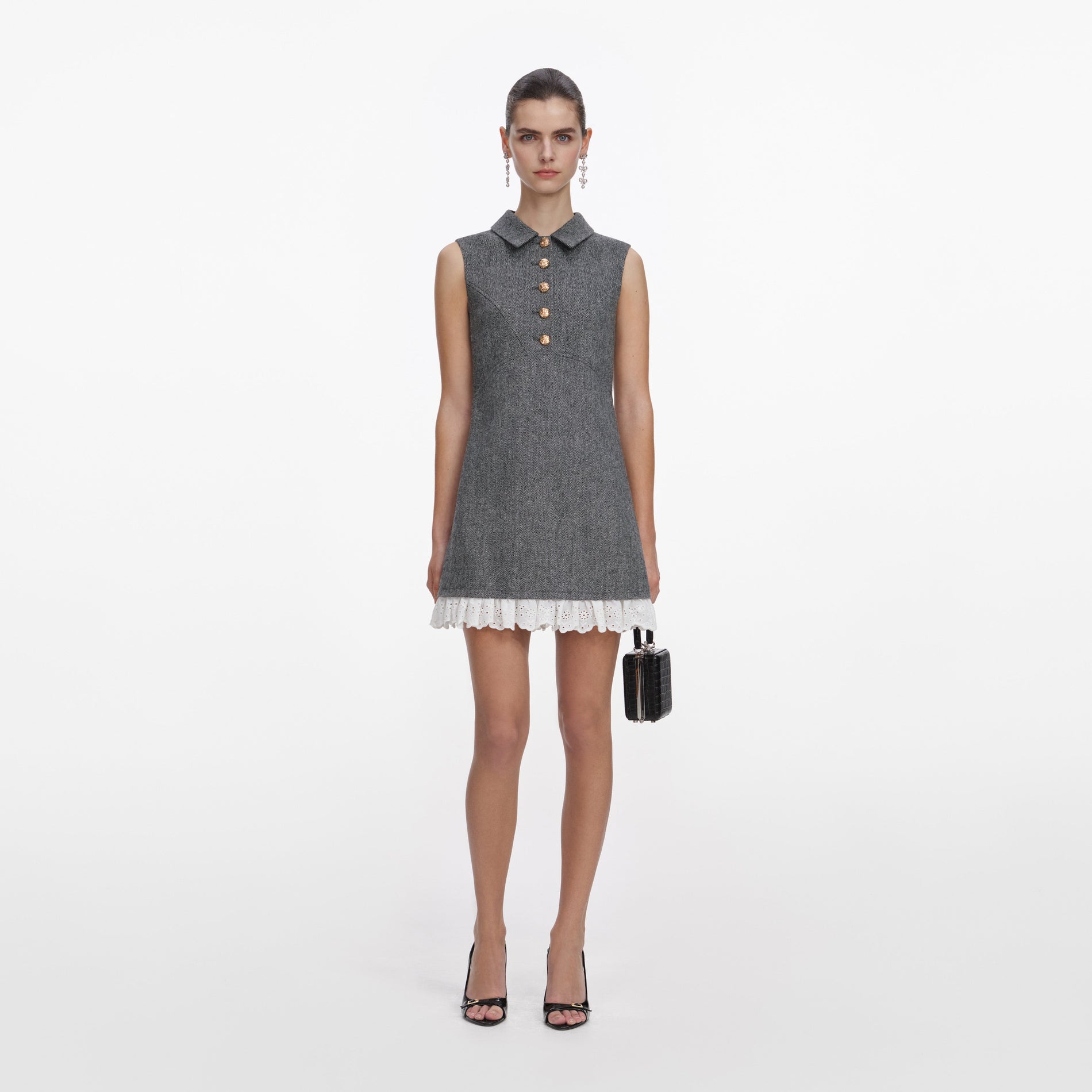 Front view of a woman wearing the Grey Herringbone Mini Dress