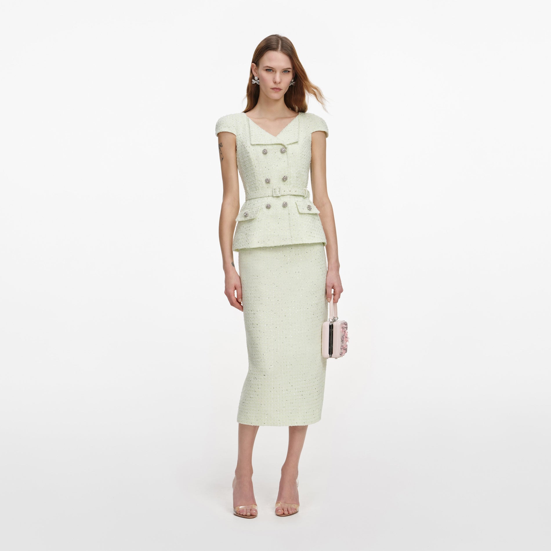 Front view of a woman wearing the Lime Boucle Midi Dress