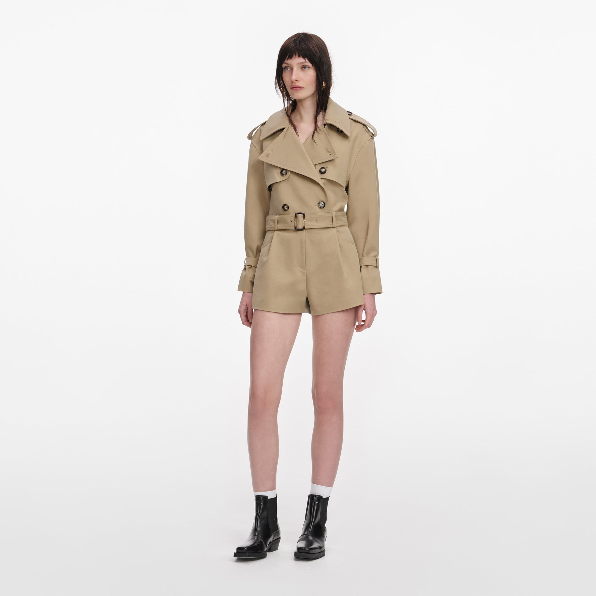 Side view of a woman wearing the Beige Cotton Playsuit