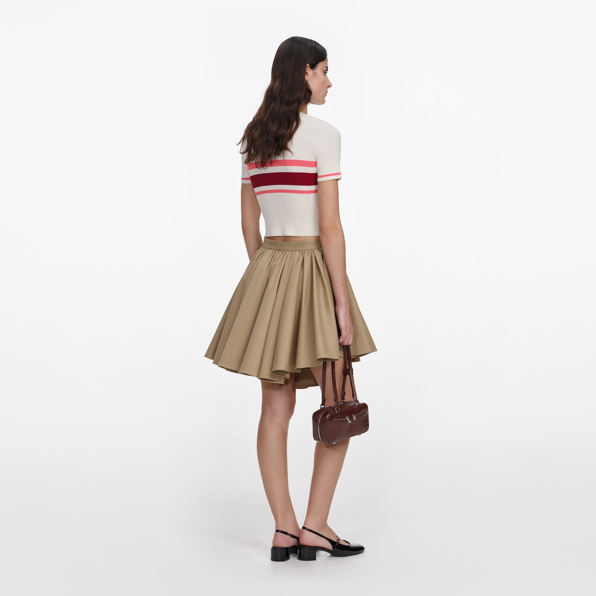 Back view of a woman wearing the Cream Stripe Viscose Knit Top