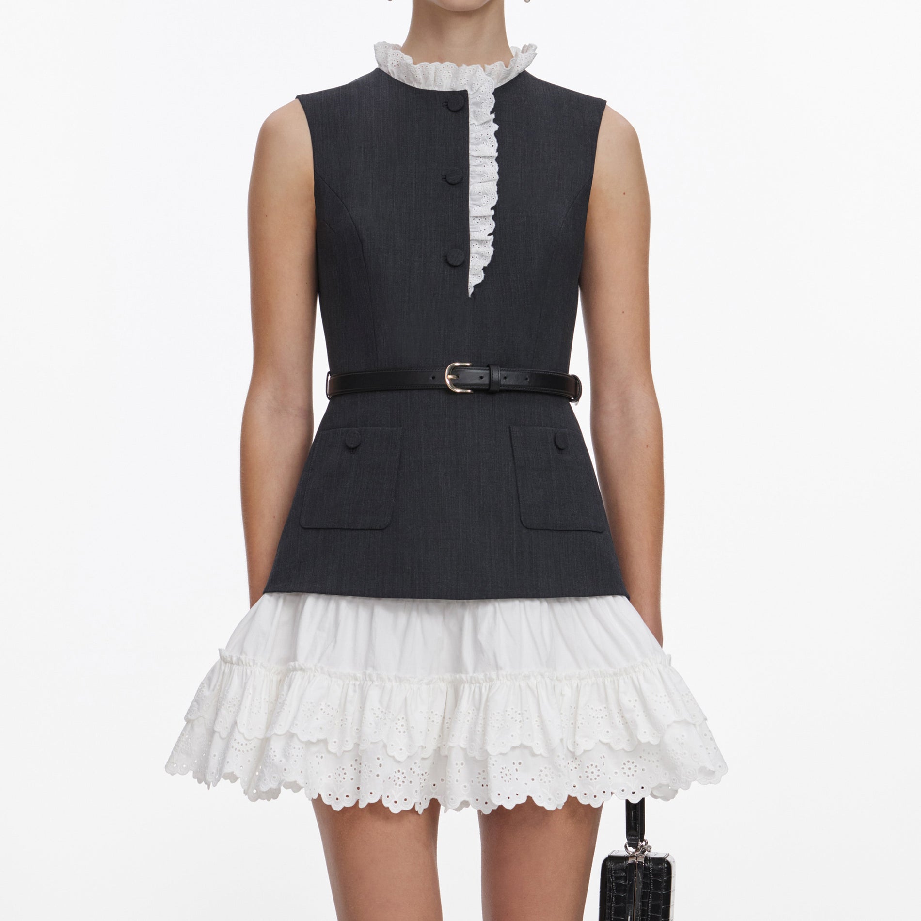 A close up of a woman wearing the Grey Tailored Cotton Frill Mini Dress