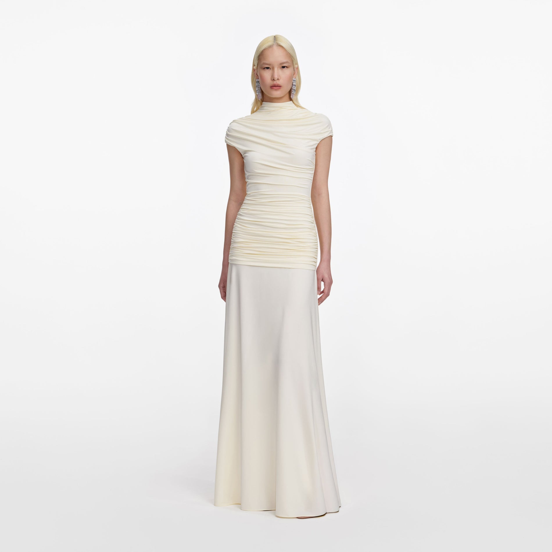 Front view of a woman wearing the Yellow Jersey Draped Maxi Dress