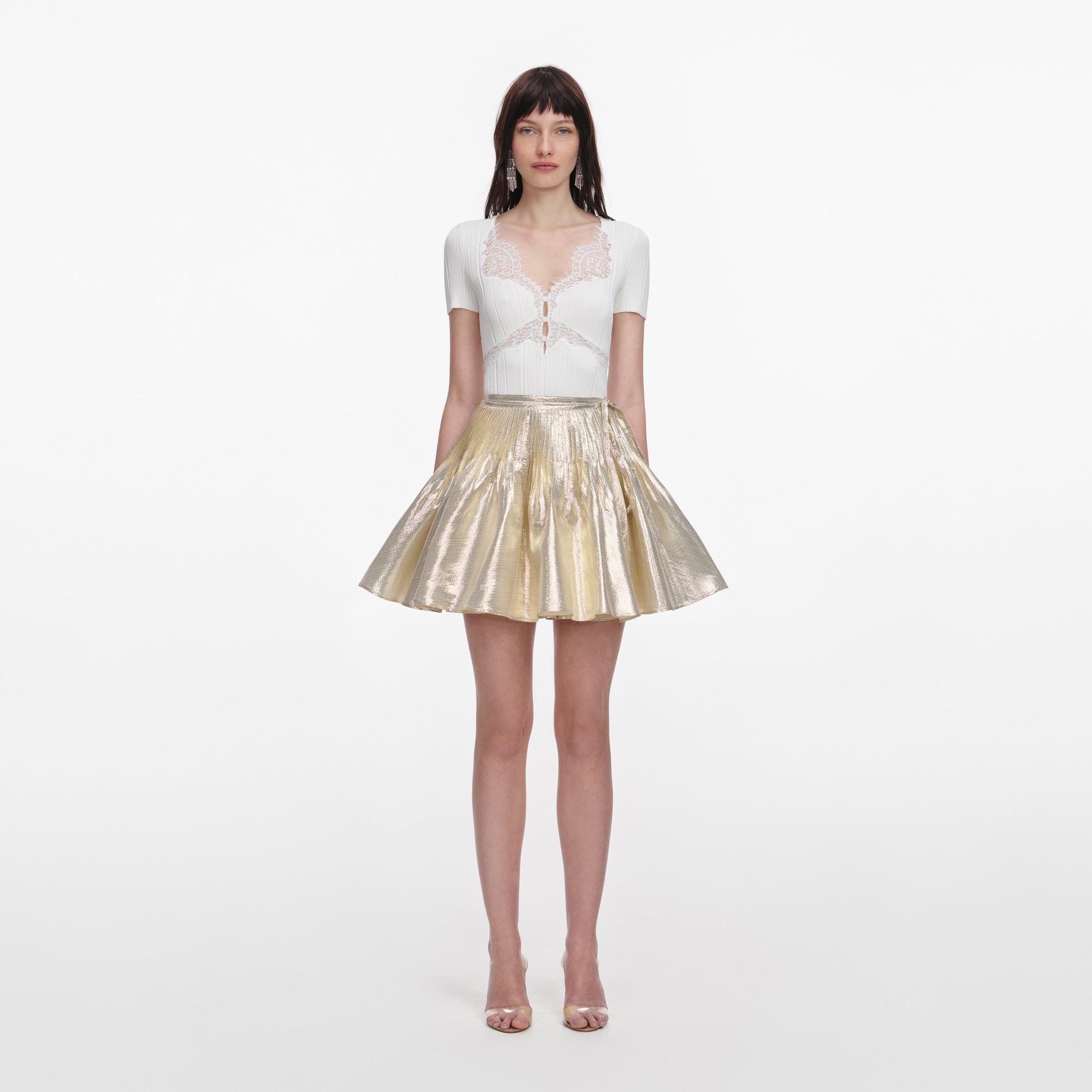 Front view of a woman wearing the White Lace Trim Knit Top