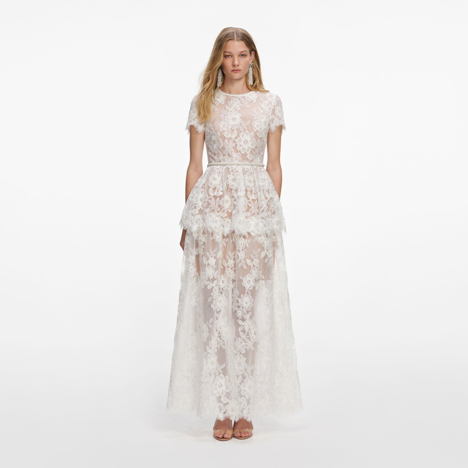 Front view of a woman wearing the White Sequin Lace Tiered Maxi Dress
