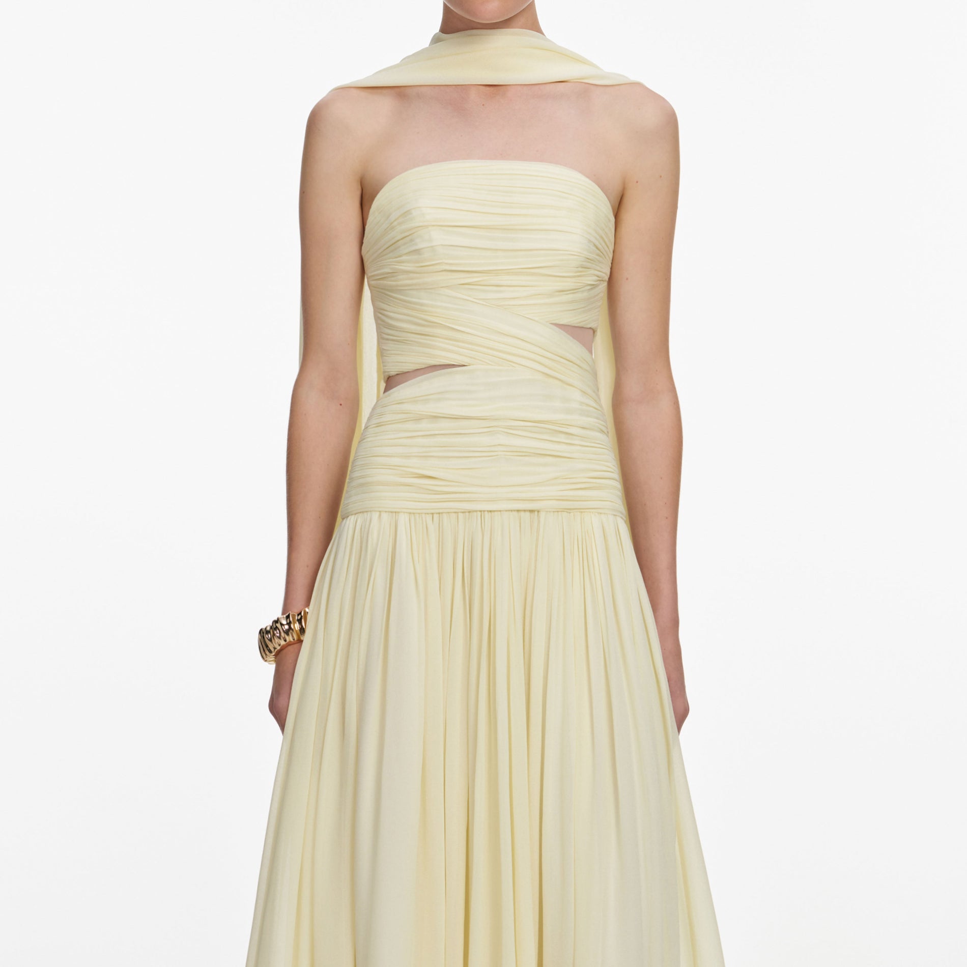 A close up of a woman wearing the Yellow Georgette Scarf Midi Dress