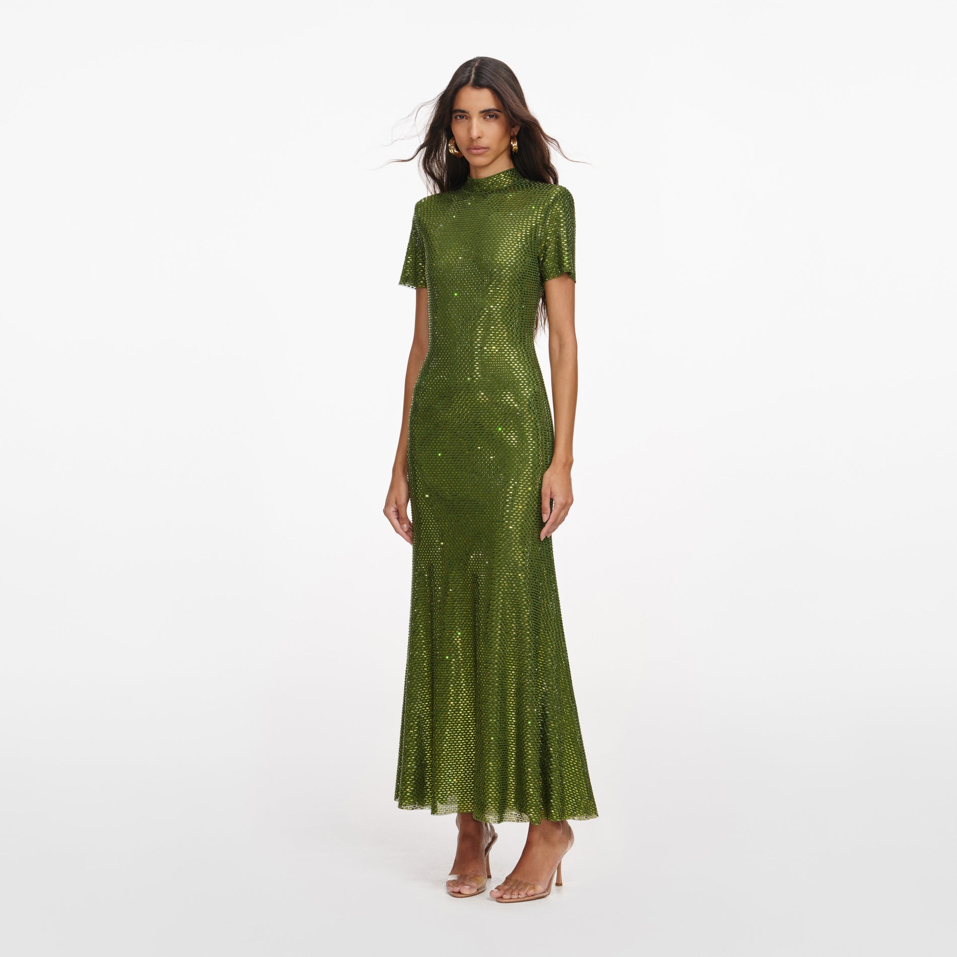 Side view of a woman wearing the Olive Rhinestone Mesh Midi Dress