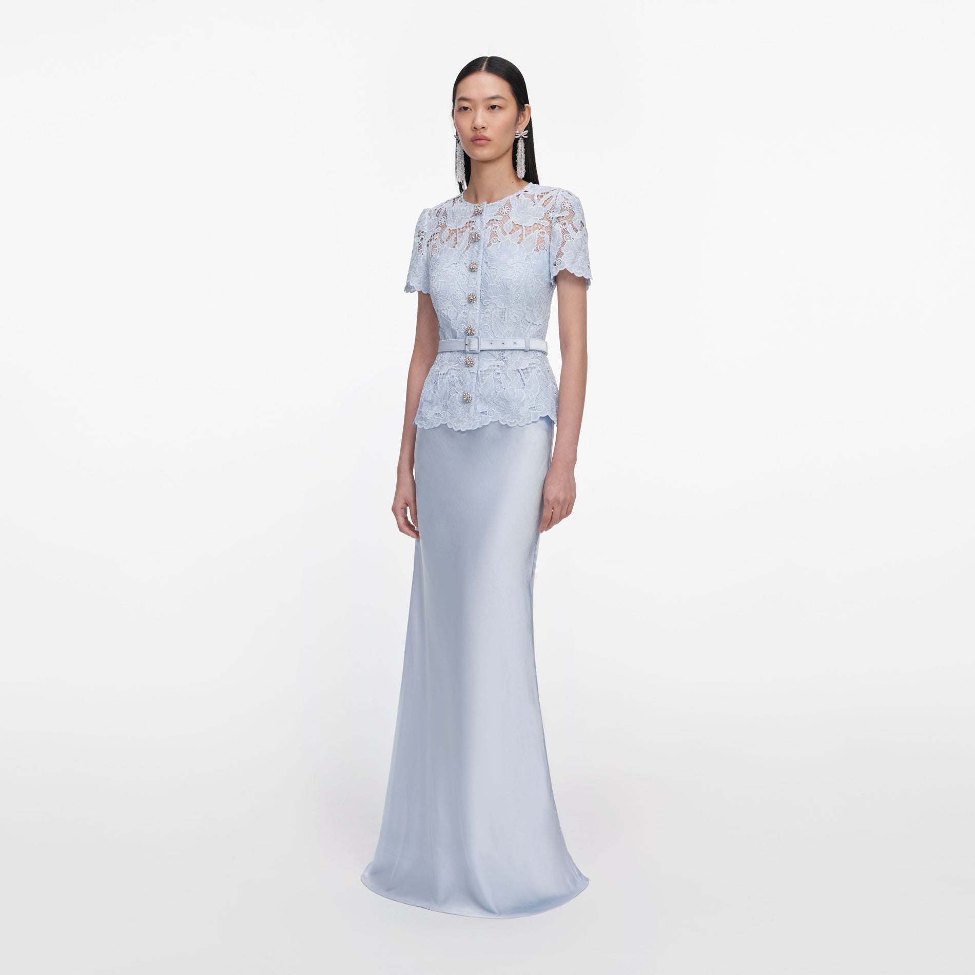 Side view of a woman wearing the Blue Lace Satin Maxi Dress