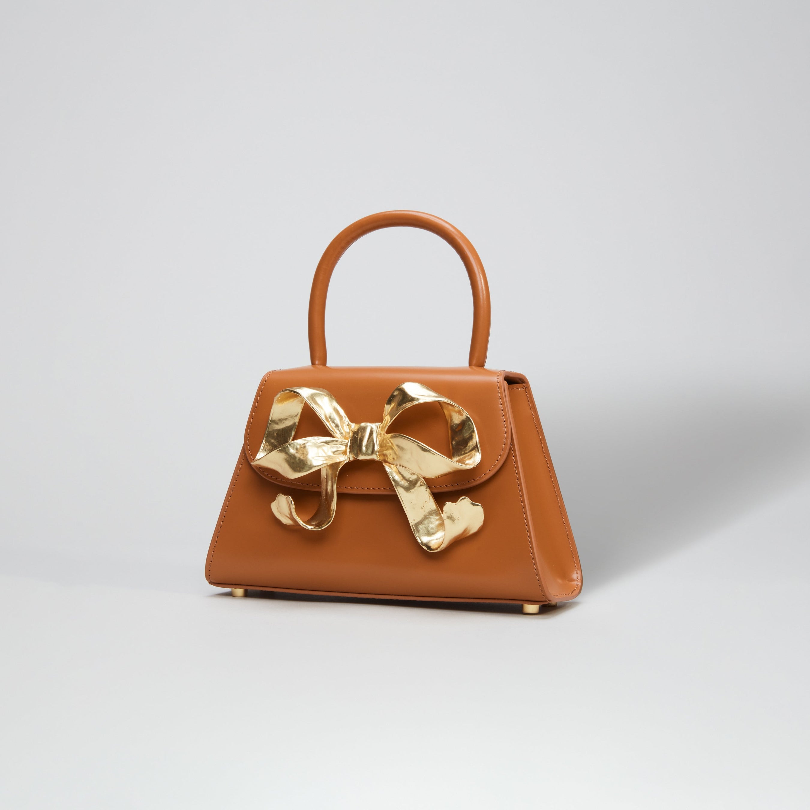 The Bow Mini in Tan with Gold Hardware