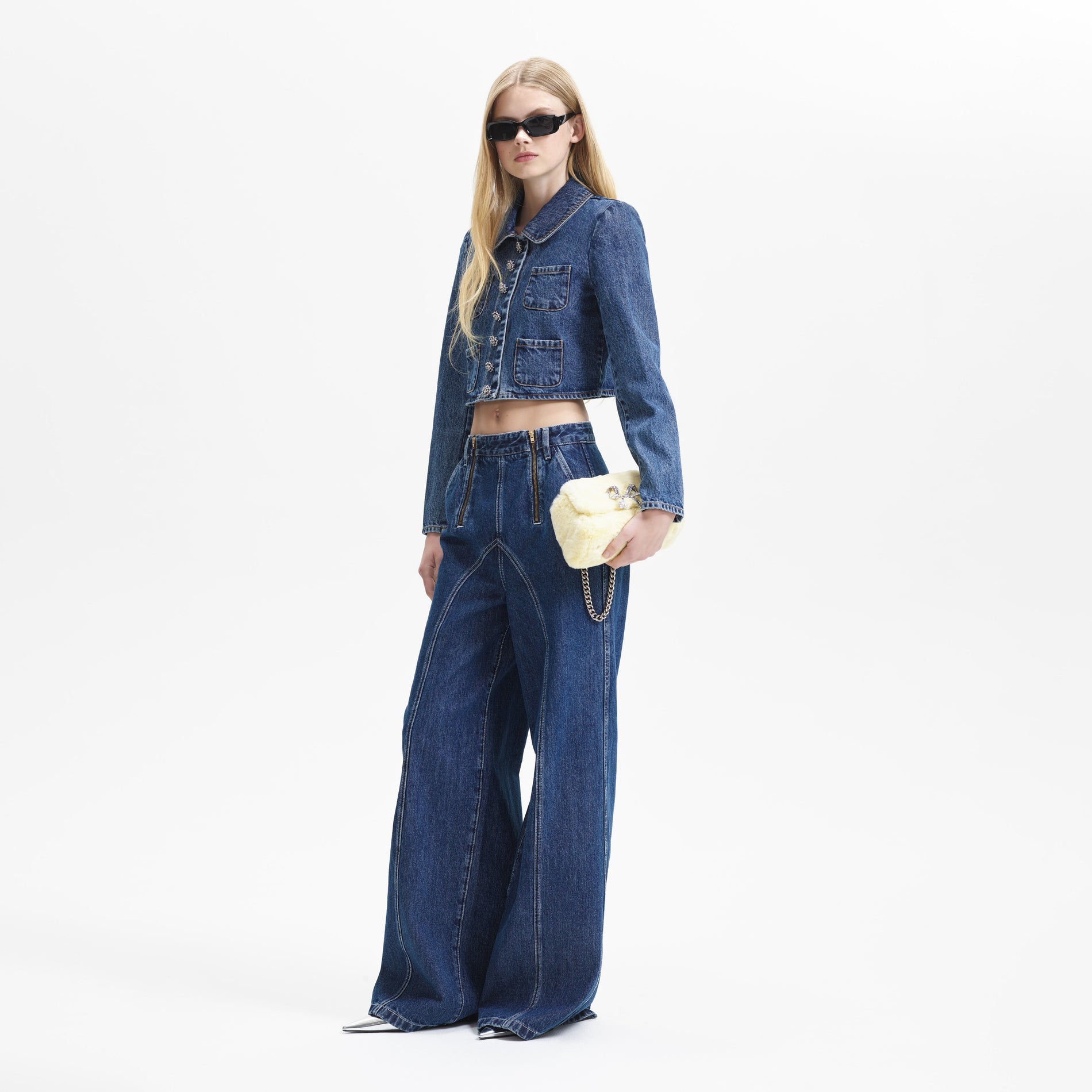 A woman wearing the Denim Jacket