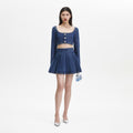 Pleated Denim Mini Skirt