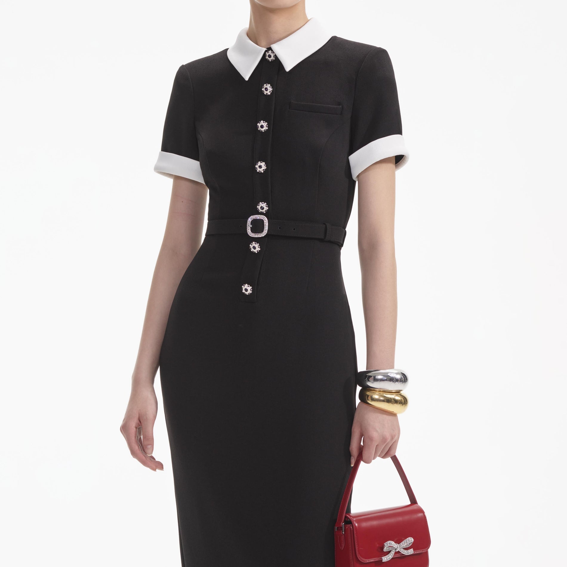 A close up of a woman wearing the Black Crepe Contrast Midi Dress