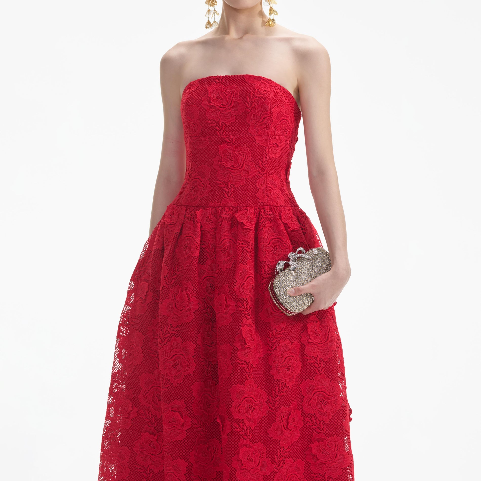 A close up of a woman wearing the Red Bandeau Lace Midi Dress