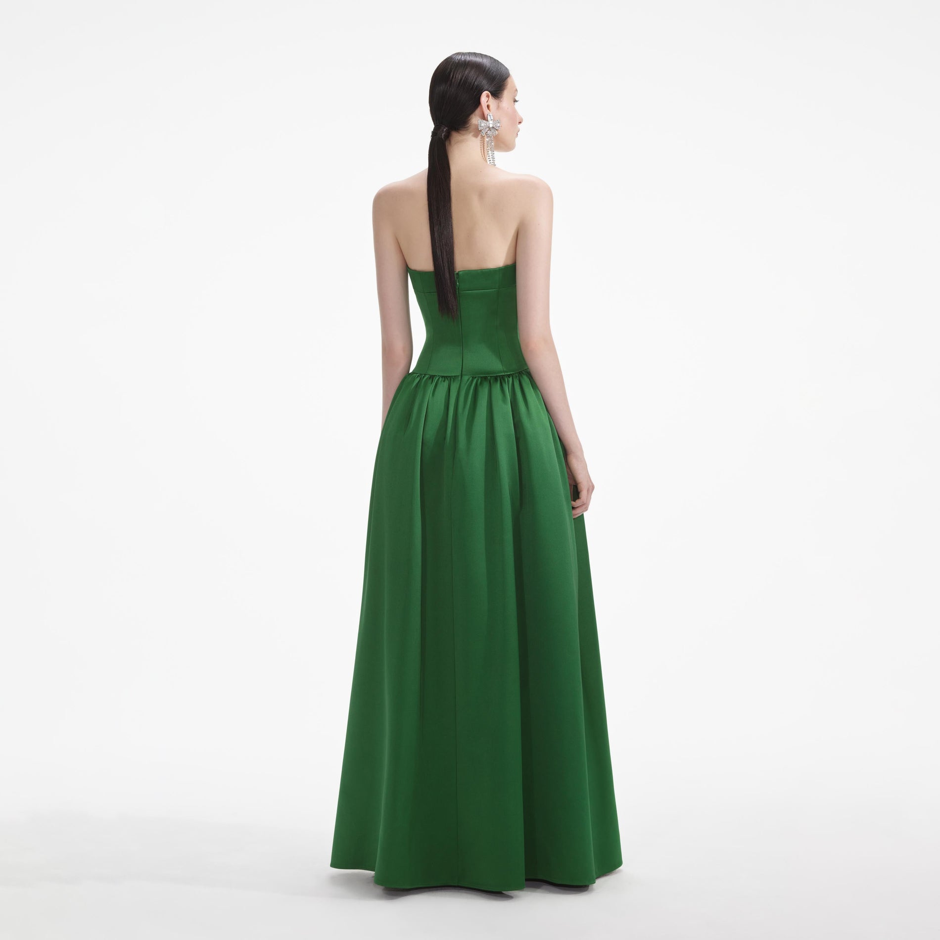 Back view of a woman wearing the White Green Satin Bandeau Maxi Dress