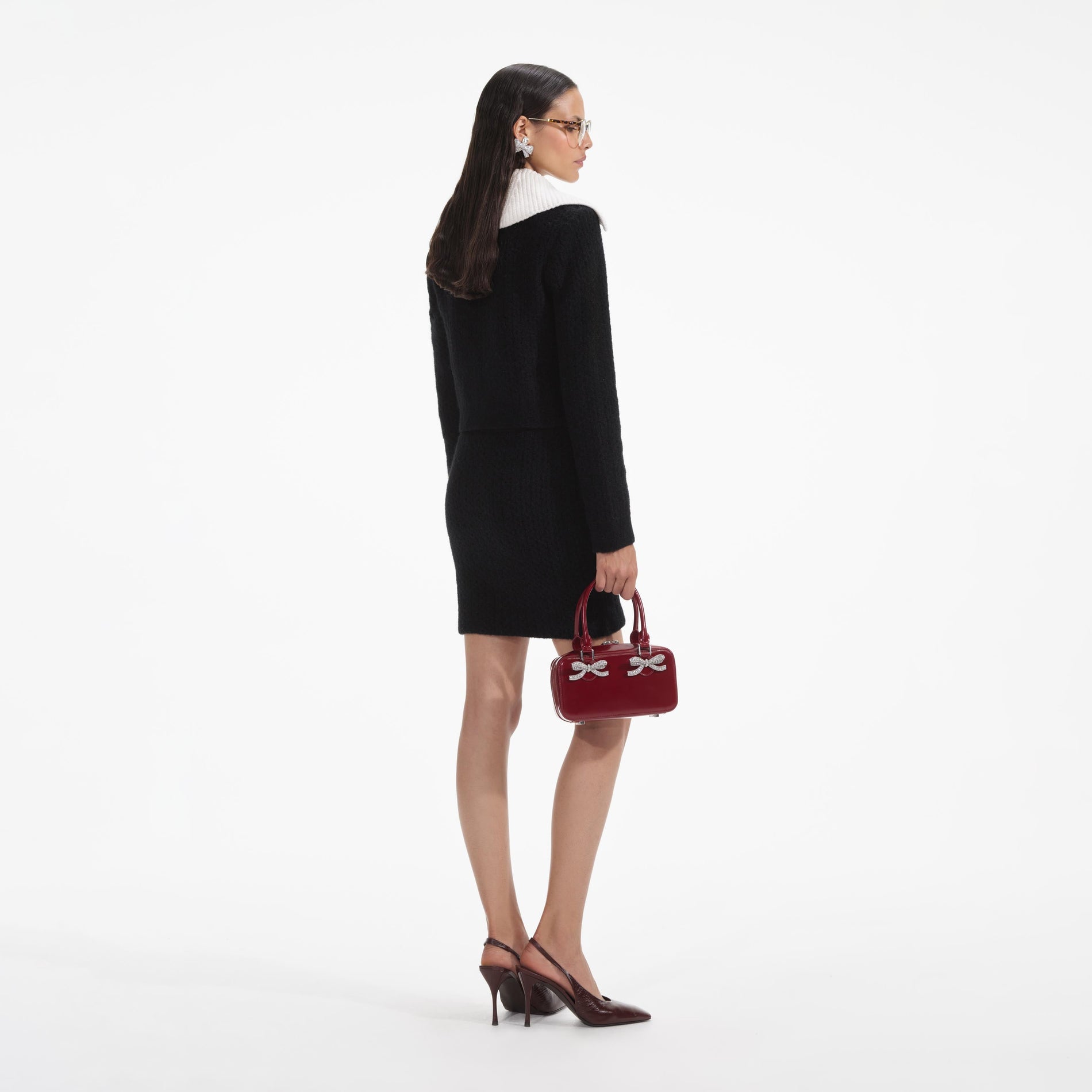 Back view of a woman wearing the White Black Cashmere Blend Knit Skirt