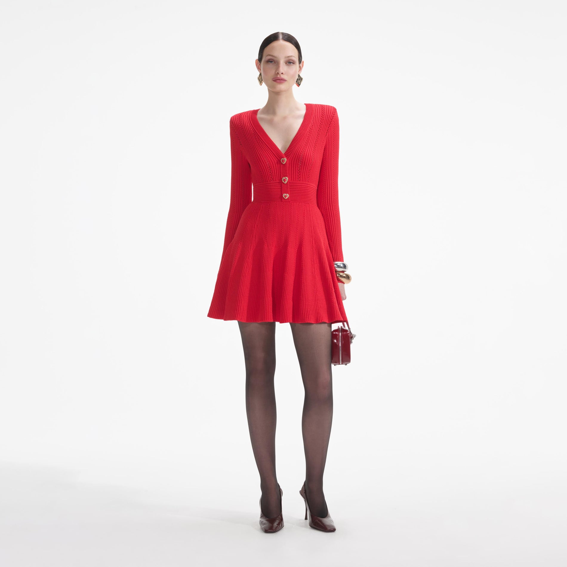 Front view of a woman wearing the Red Pointelle Knit Mini Dress