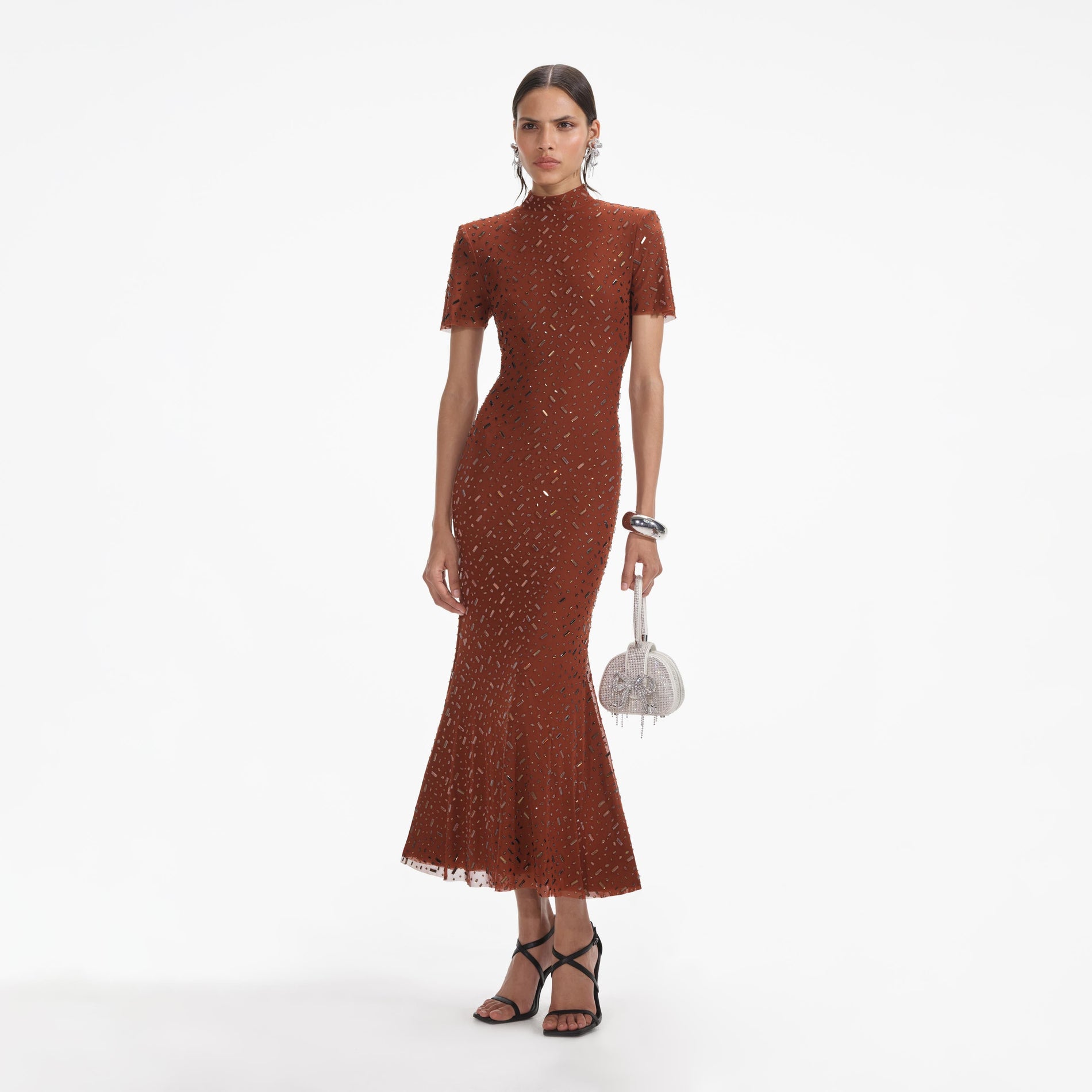 Side view of a woman wearing the Brown Square Rhinestone Mesh Midi Dress