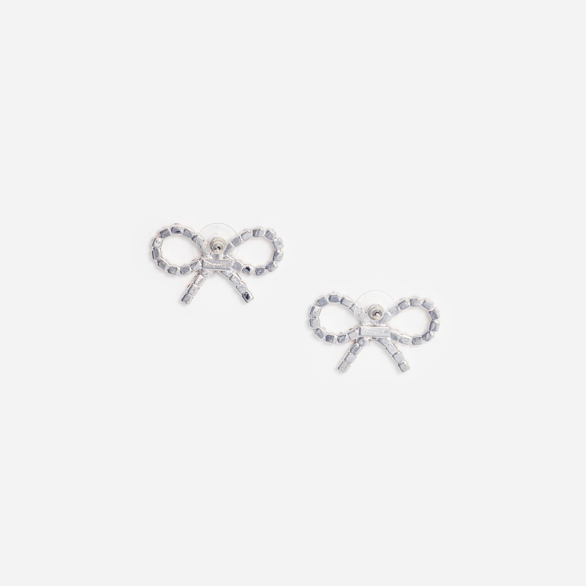 Side view of a woman wearing the Mini Bow Crystal Earrings