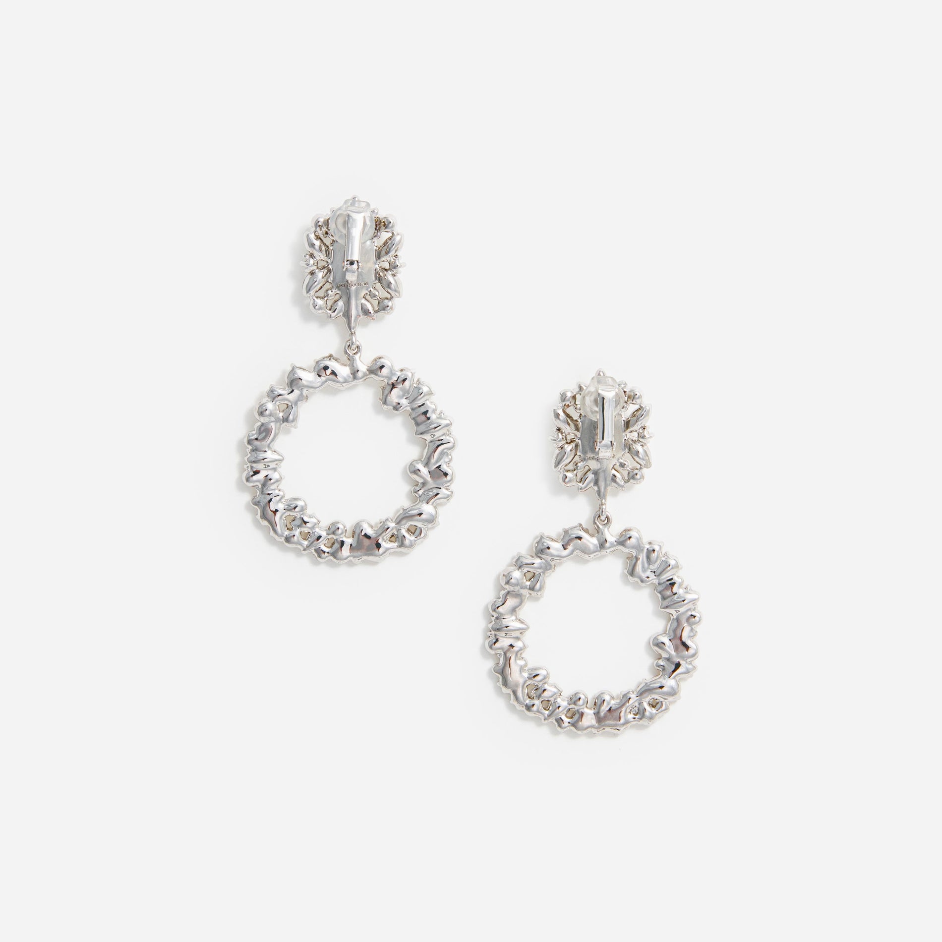 Side view of a woman wearing the Crystal Hoop Earrings