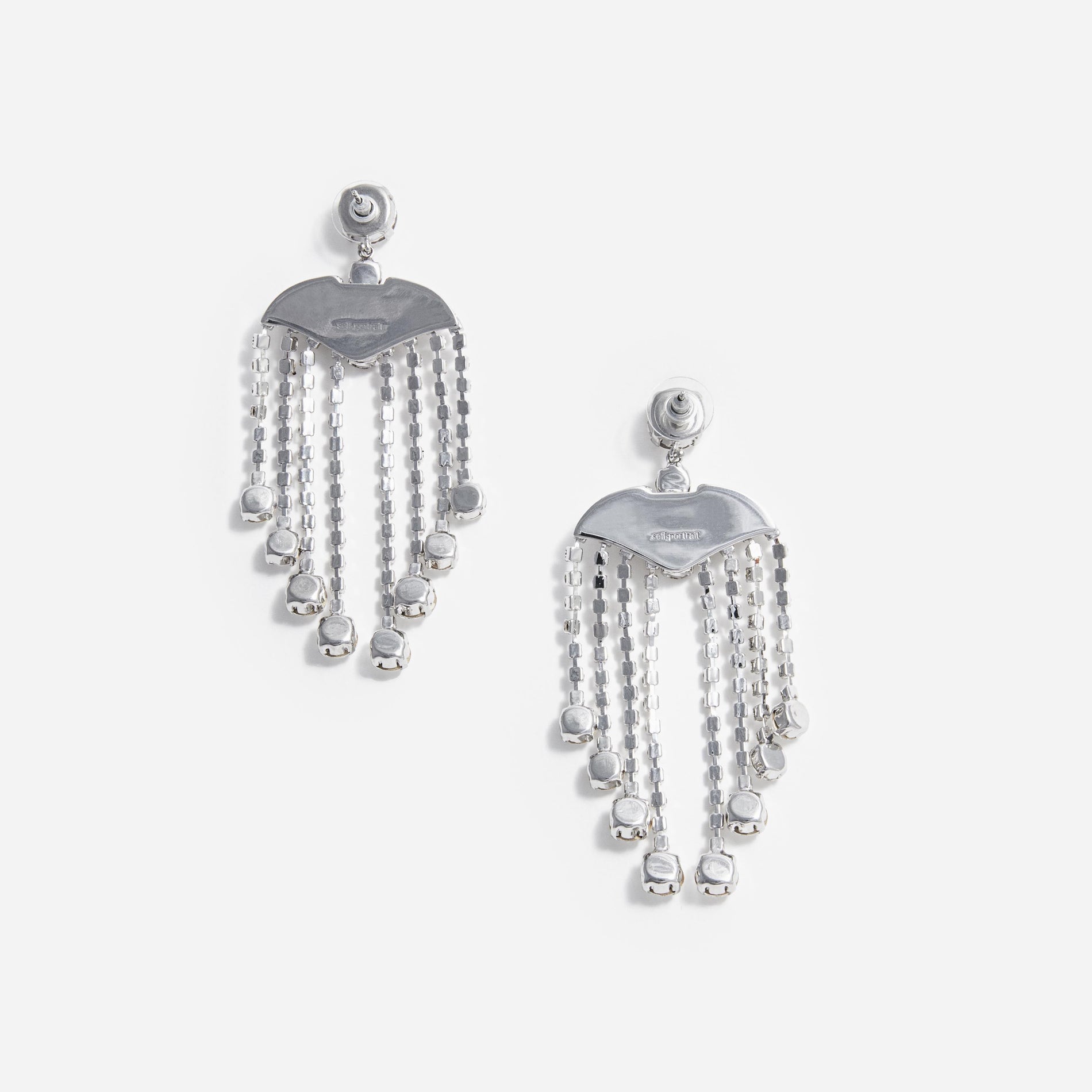 Side view of a woman wearing the Crystal Chanderlier Earrings
