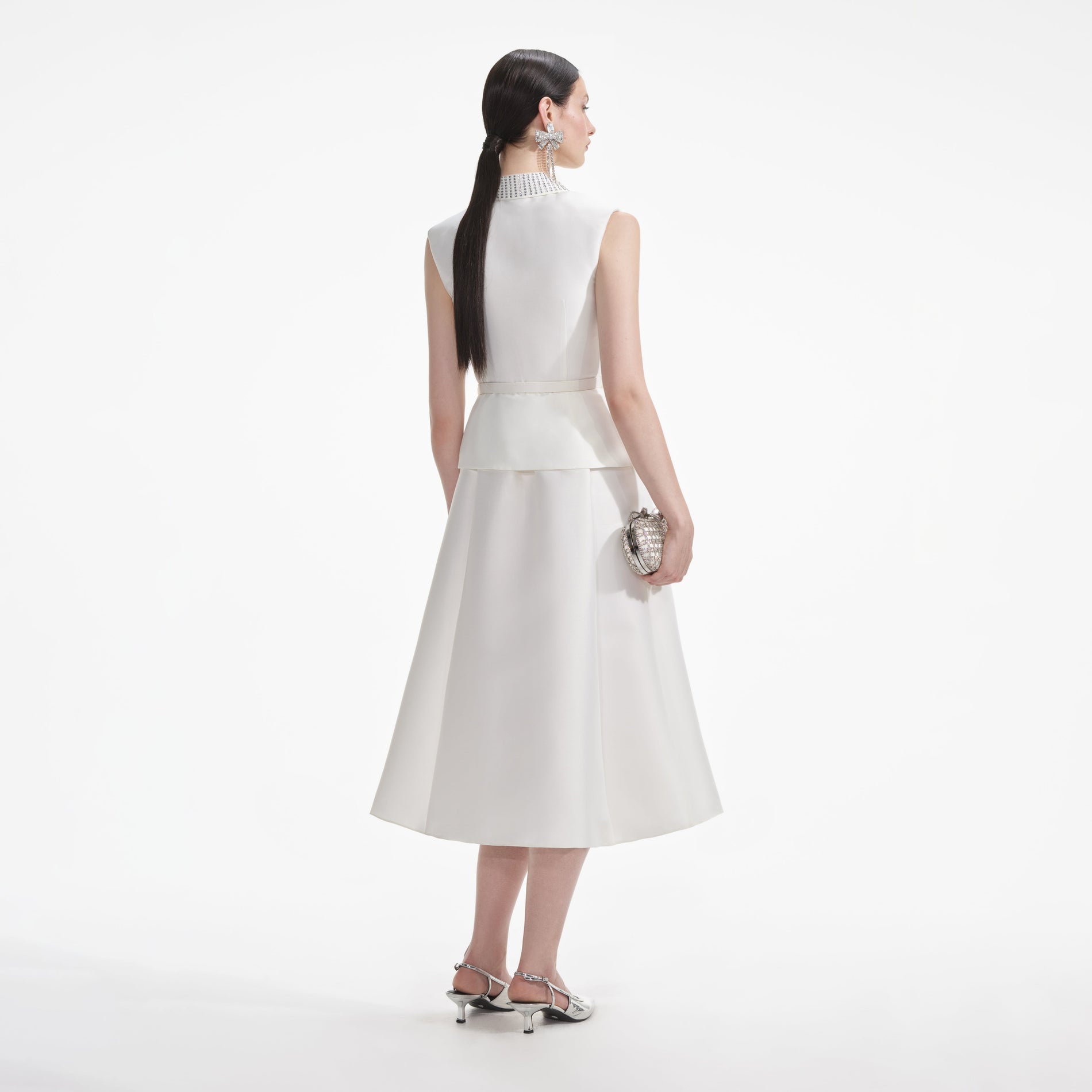 Back view of a woman wearing the White Cream Taffeta Diamante Midi Dress