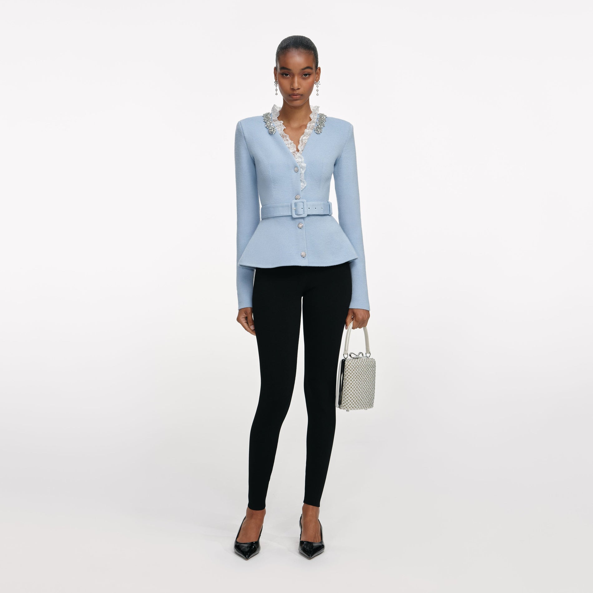 Front view of a woman wearing the Blue Crystal Trim Cardigan