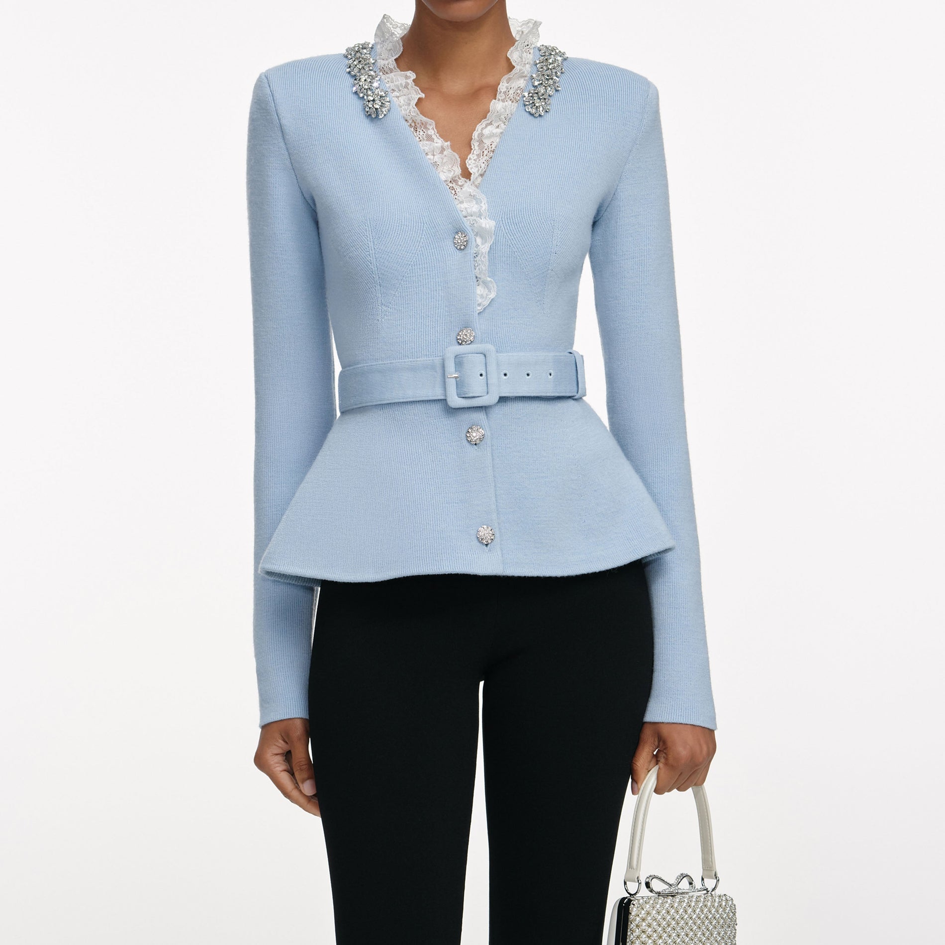 A close up of a woman wearing the Brown Embellished Trim Cardigan