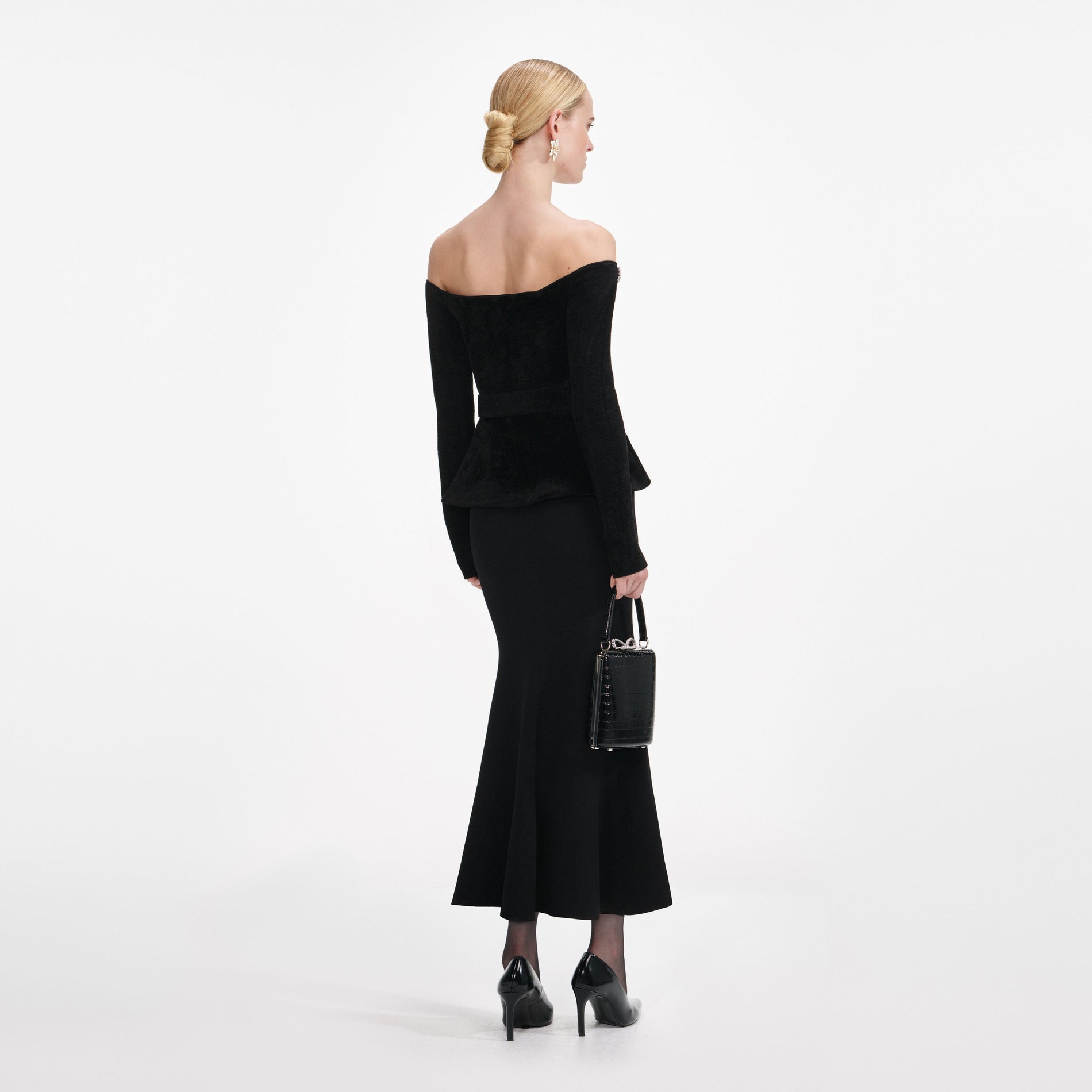 Back view of a woman wearing the Black Chenille Knit Crystal Trim Midi Dress