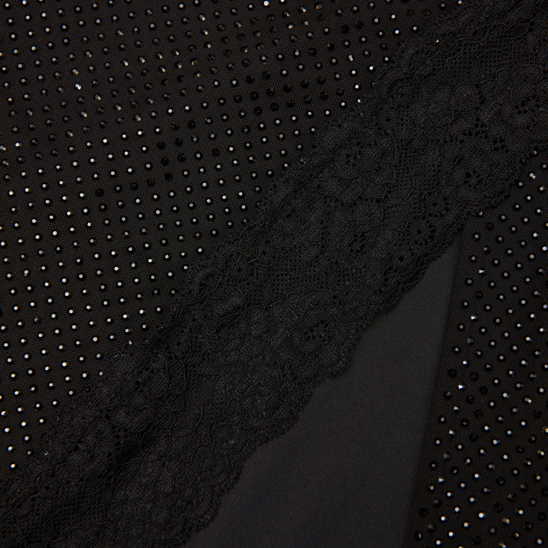 A close up of the fabric for the Black Rhinestone Midi Skirt