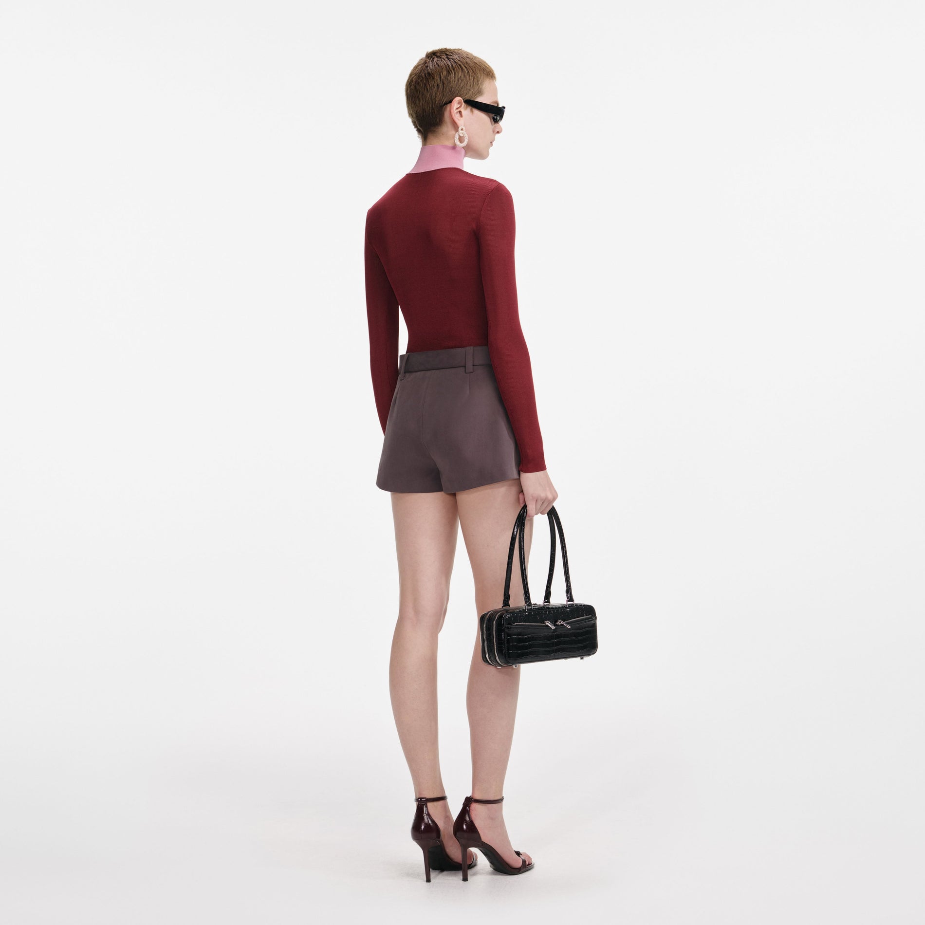 Back view of a woman wearing the Burgundy Contrast Viscose Knit Top
