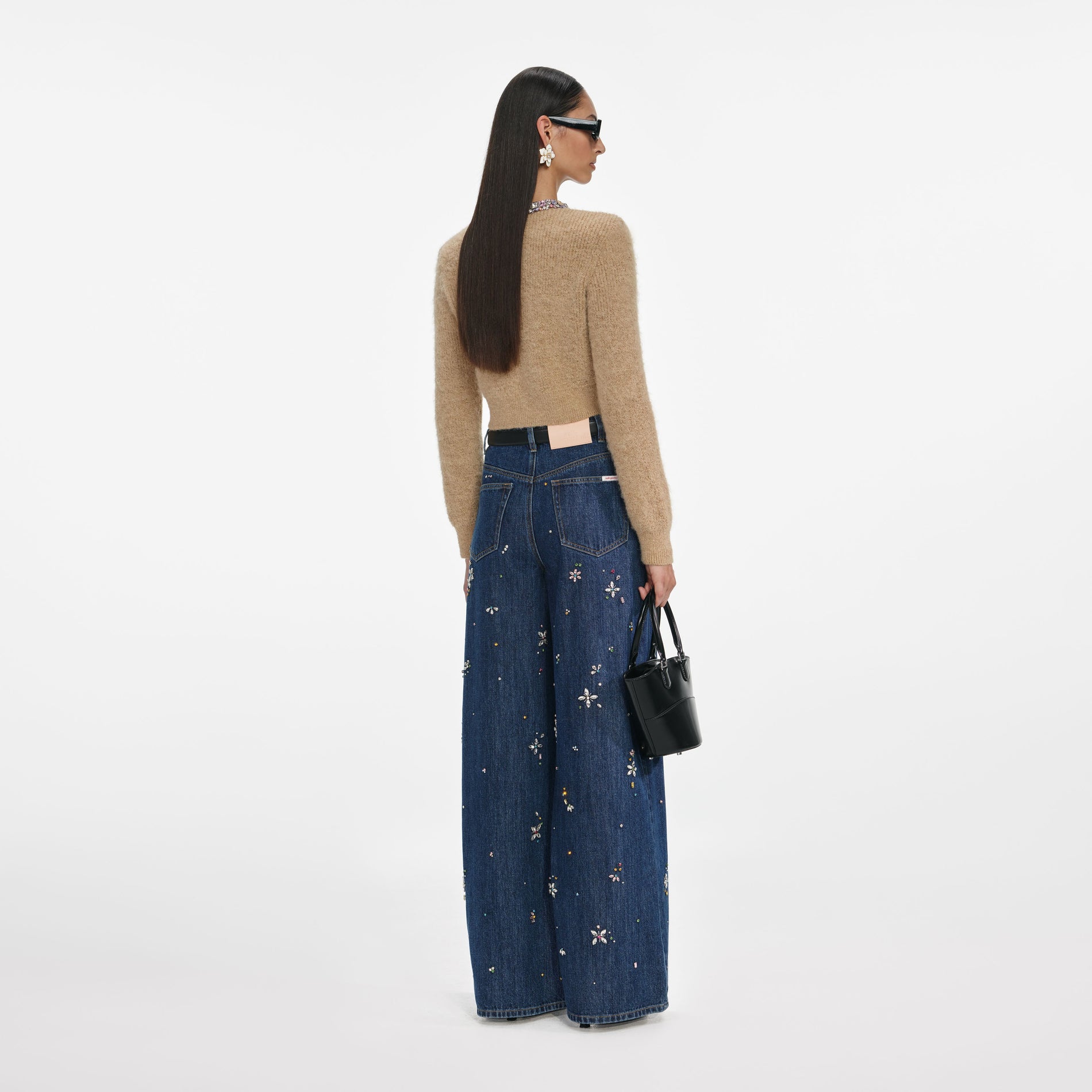 Back view of a woman wearing the Brown Embellished Trim Cardigan