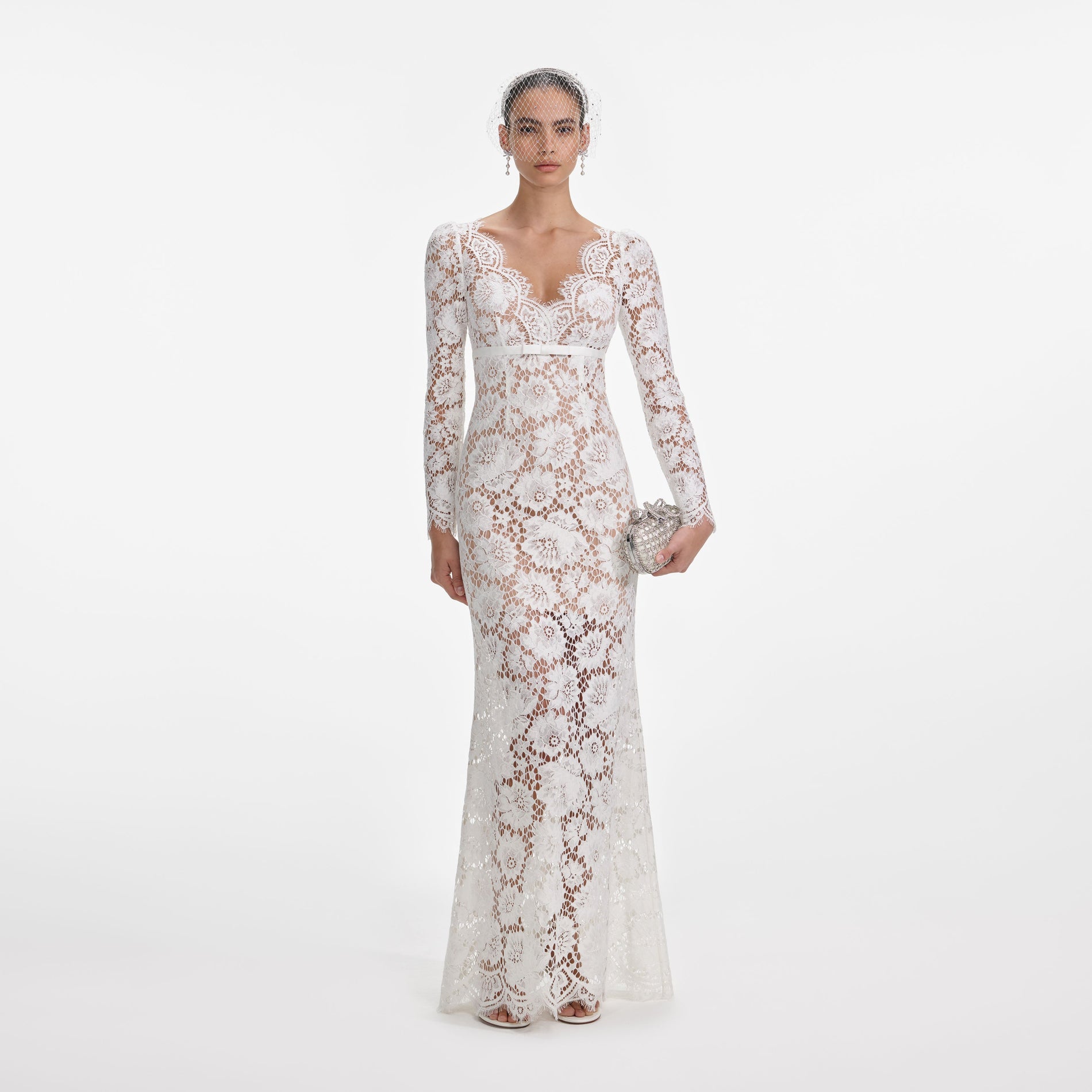 Front view of a woman wearing the White Floral Lace Maxi Dress