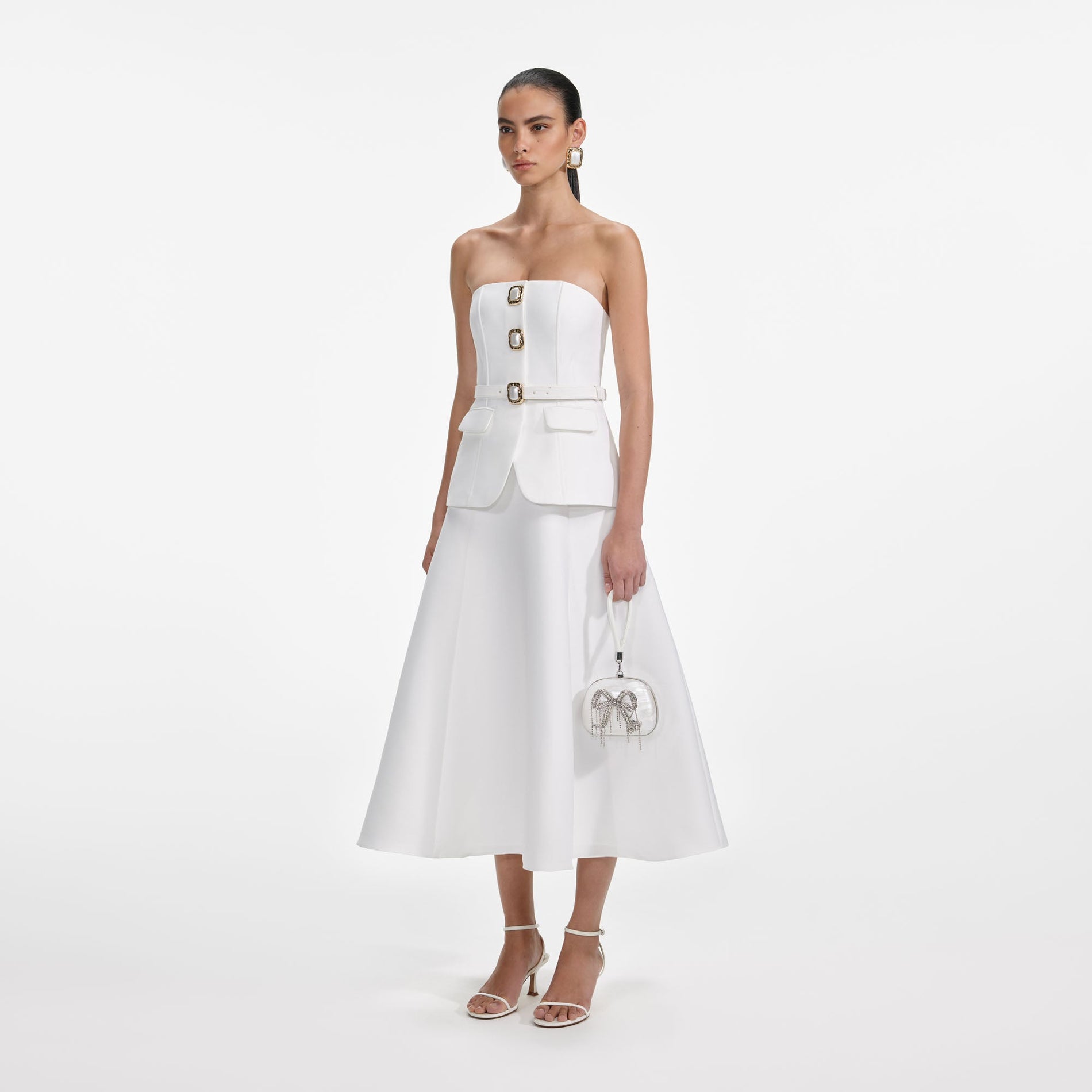 Side view of a woman wearing the White Taffeta Bandeau Midi Dress