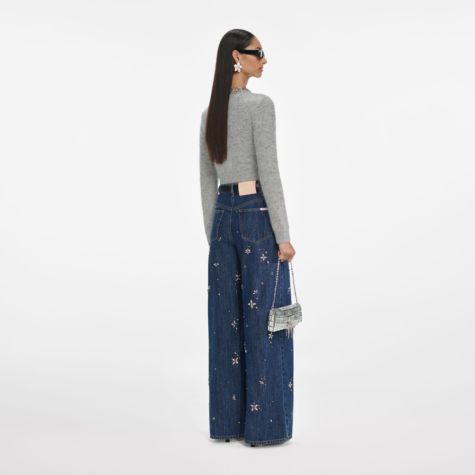 Back view of a woman wearing the Grey Alpaca Knit Cardigan