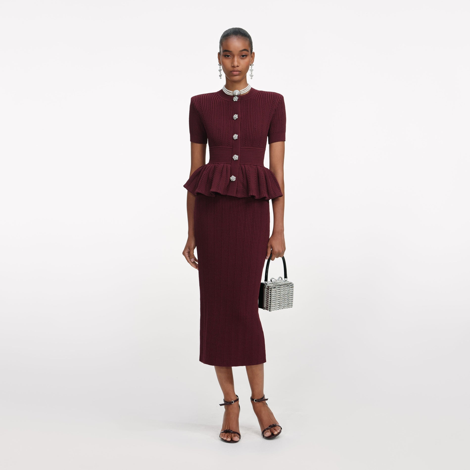 Front view of a woman wearing the Bordeaux Pointelle Knit Midi Dress