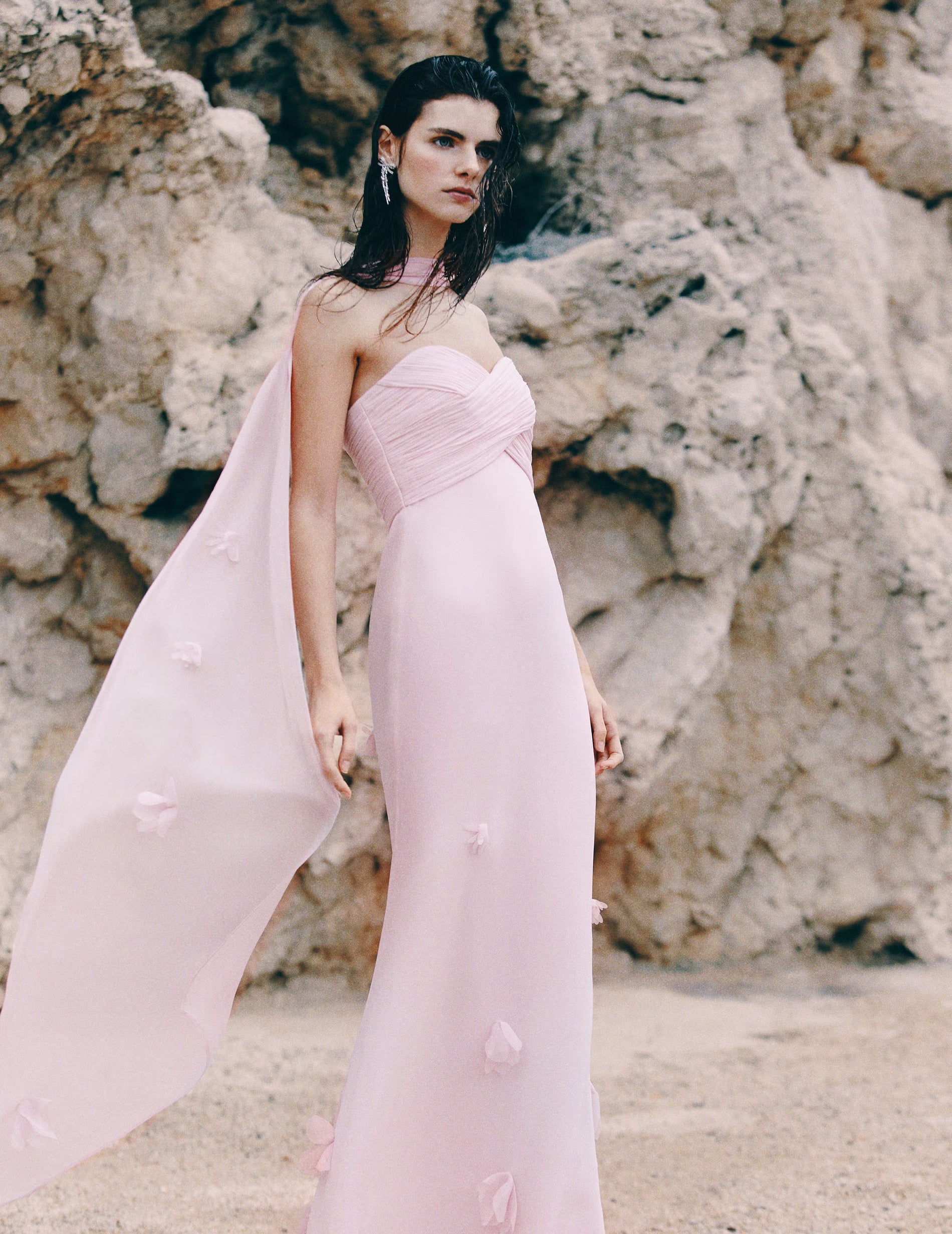 A lifestyle image of a woman wearing the Pink Georgette Scarf Maxi Dress