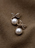Gold Bow Pearl Jacket Earrings