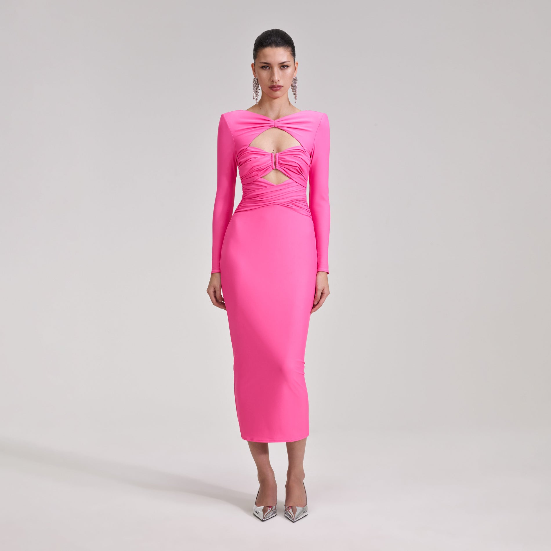 A woman wearing the Pink Jersey Midi Dress