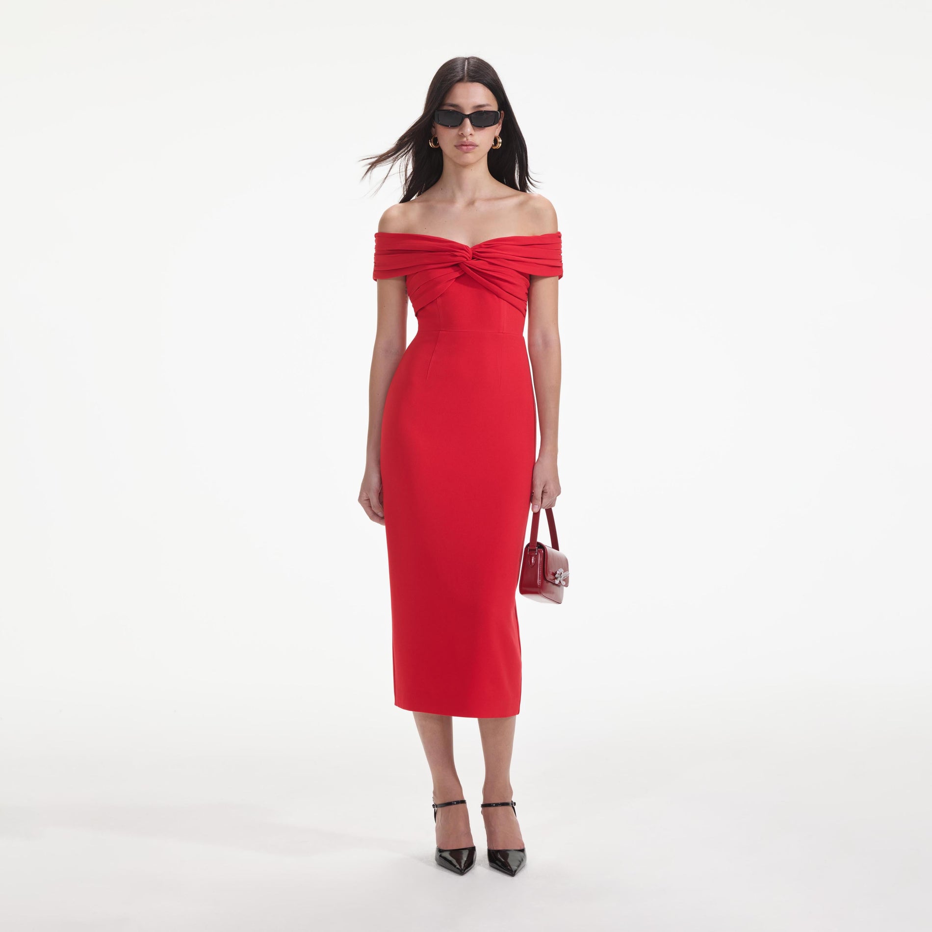 Front view of a woman wearing the Red Off Shoulder Midi Dress