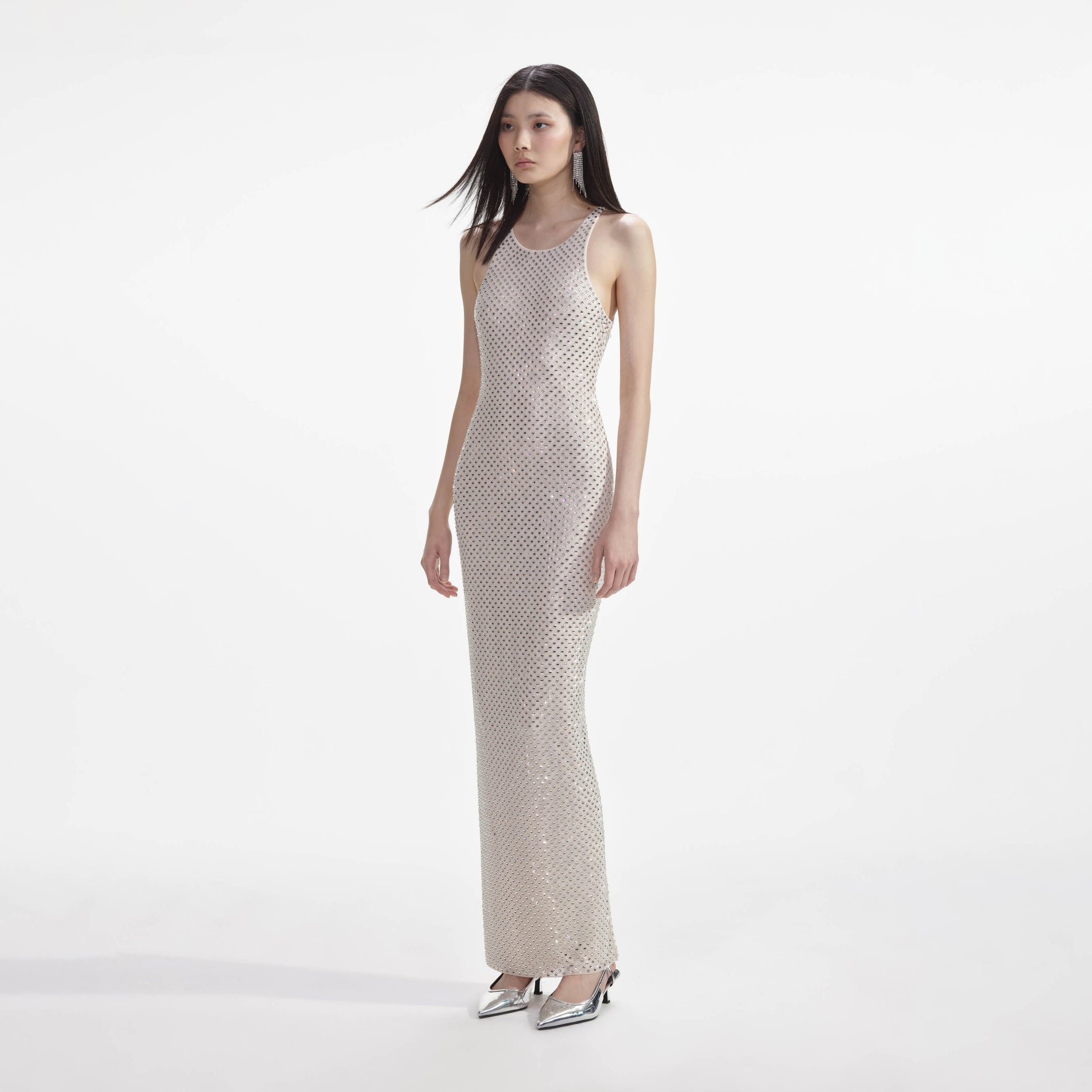 Side view of a woman wearing the Cream Mesh Rhinestone Maxi Dress