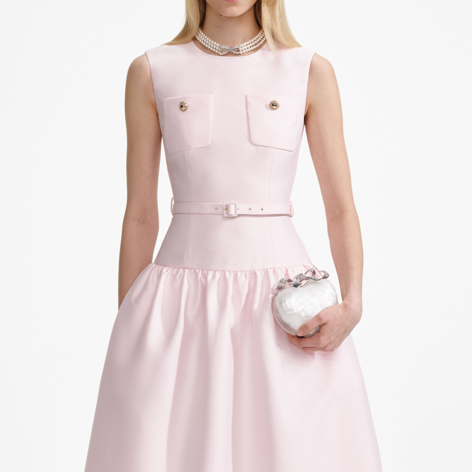 A close up of a woman wearing the Pink Taffeta Midi Dress