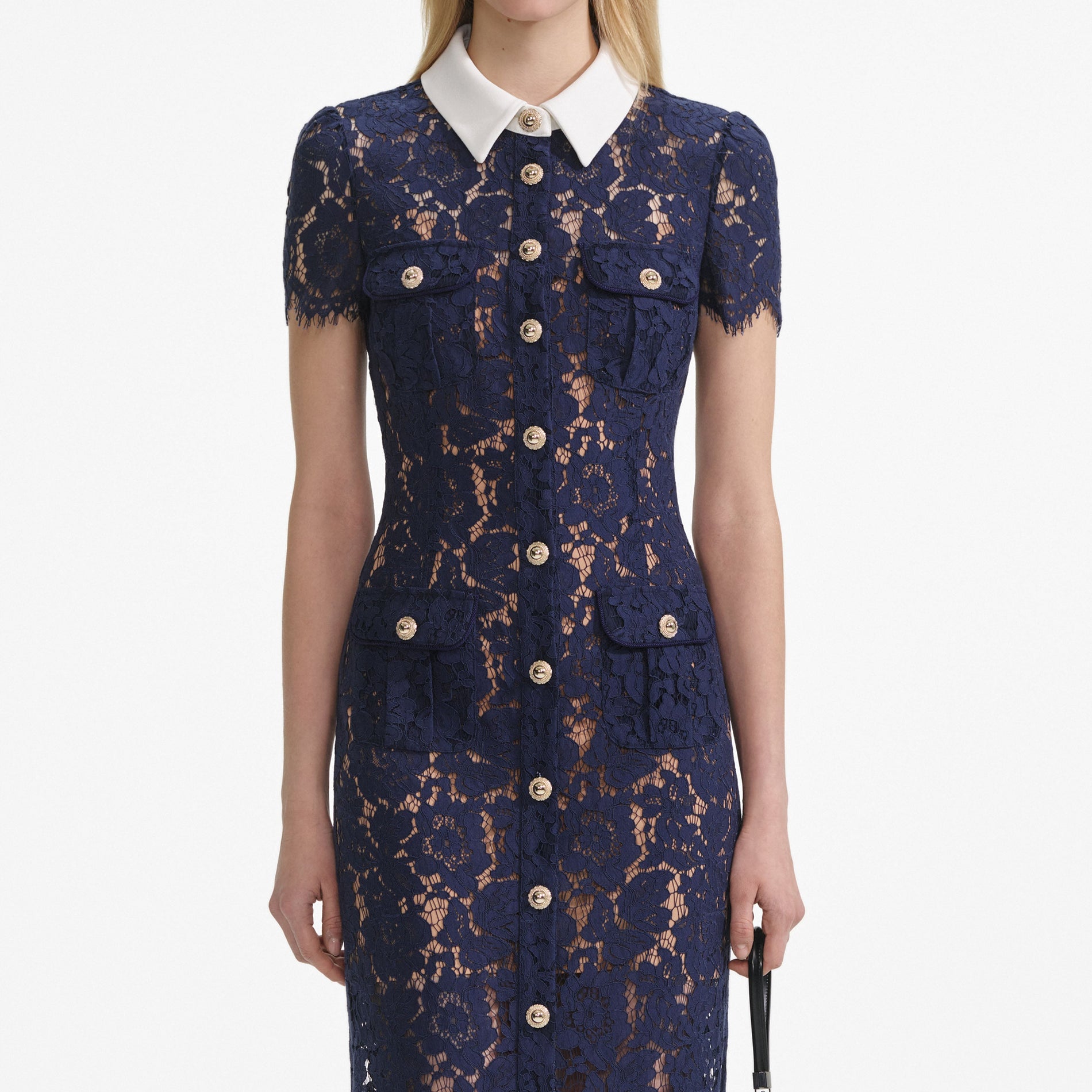 A close up of a woman wearing the Navy Lace Contrast Collar Midi Dress