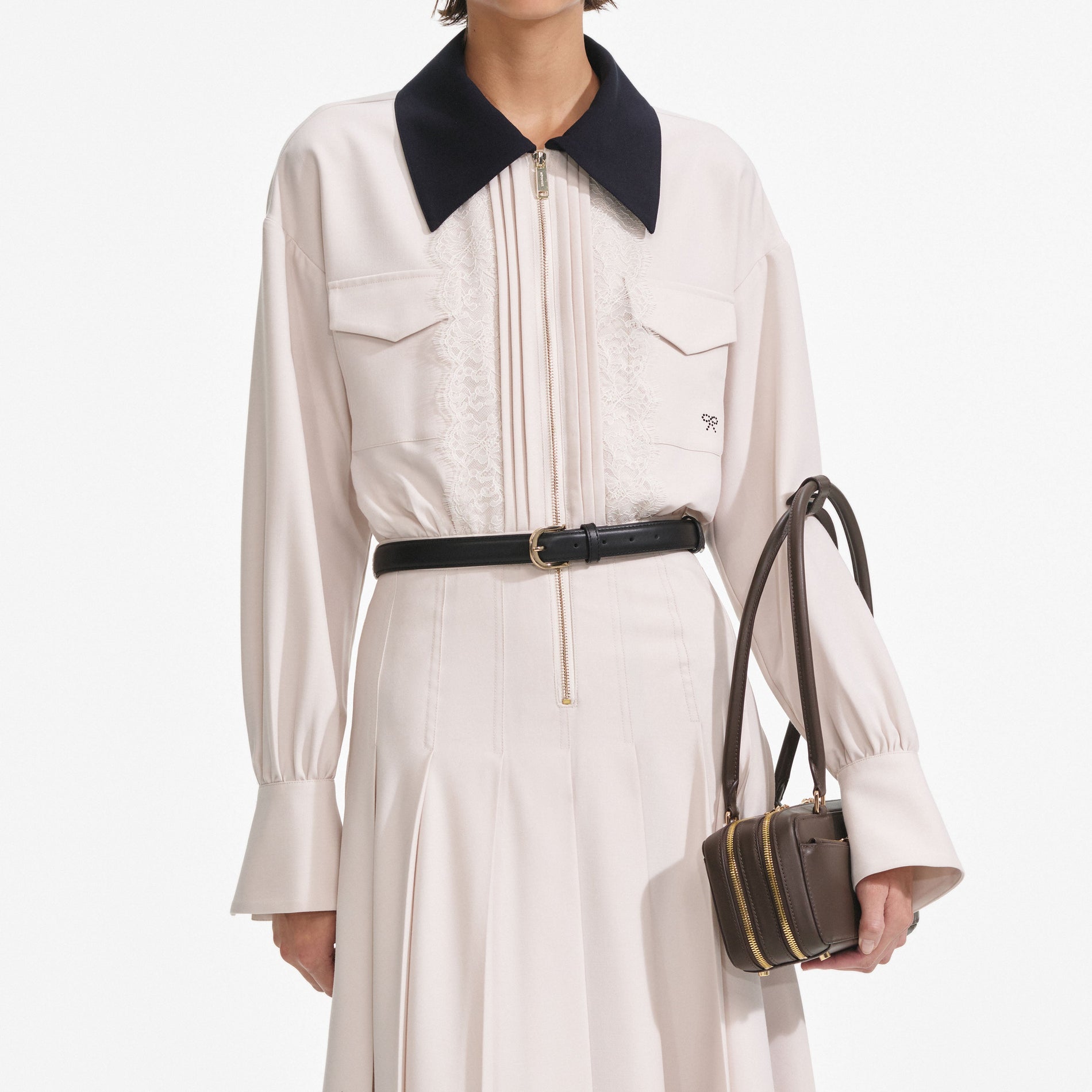 A close up of a woman wearing the Cream Twill Contrast Collar Midi Dress