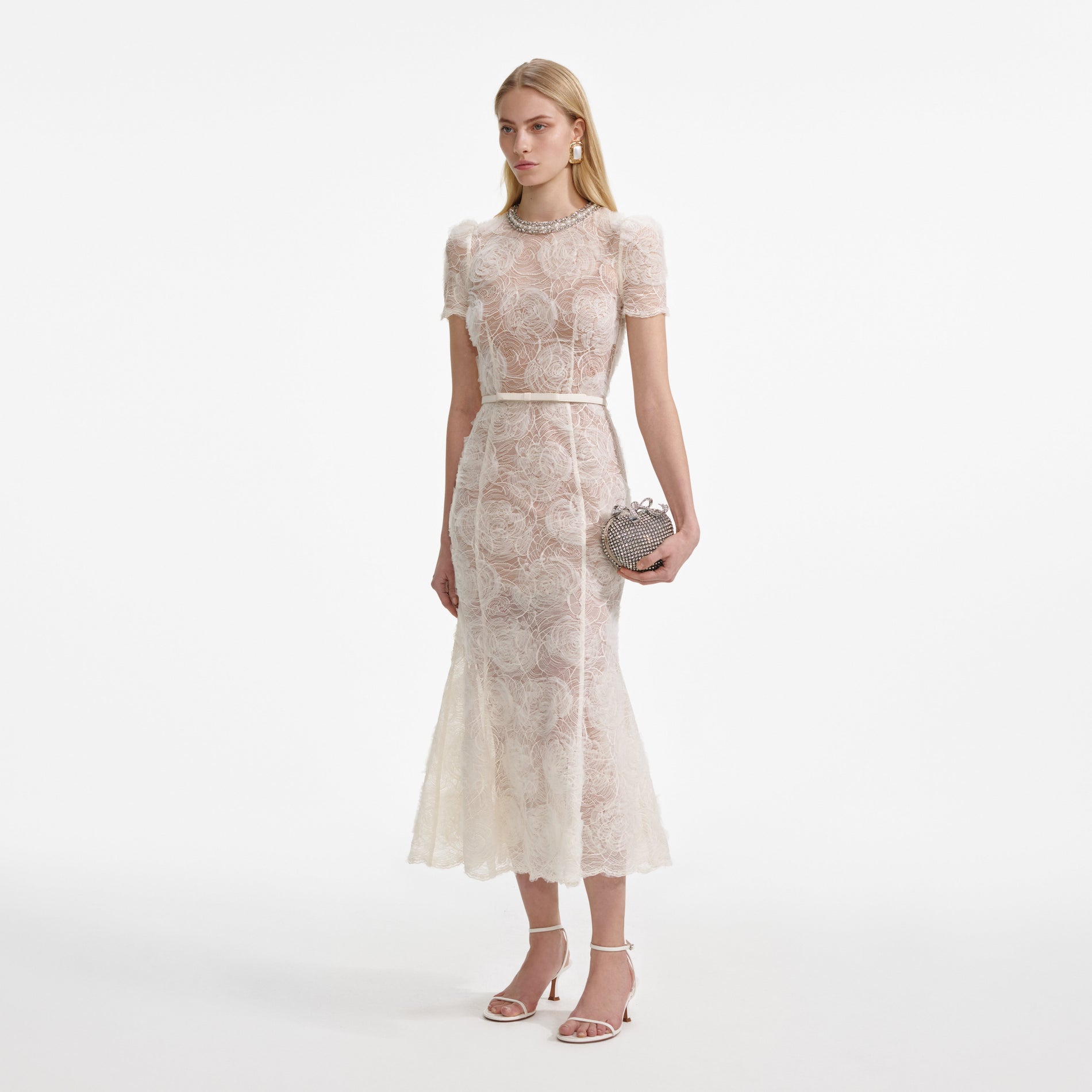 Side view of a woman wearing the Cream Tulle Lace Midi Dress