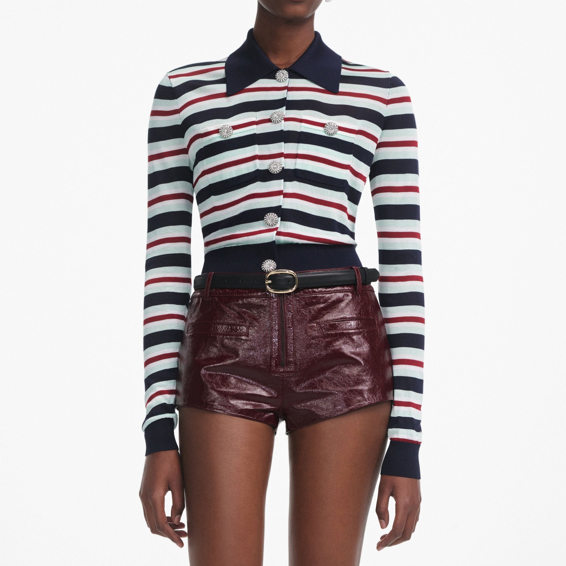 A close up of a woman wearing the Navy Striped Viscose Knit Top