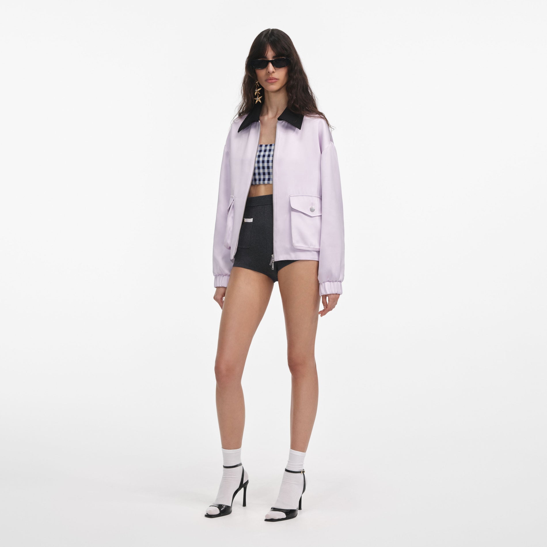 Side view of a woman wearing the Lilac Viscose Jacket
