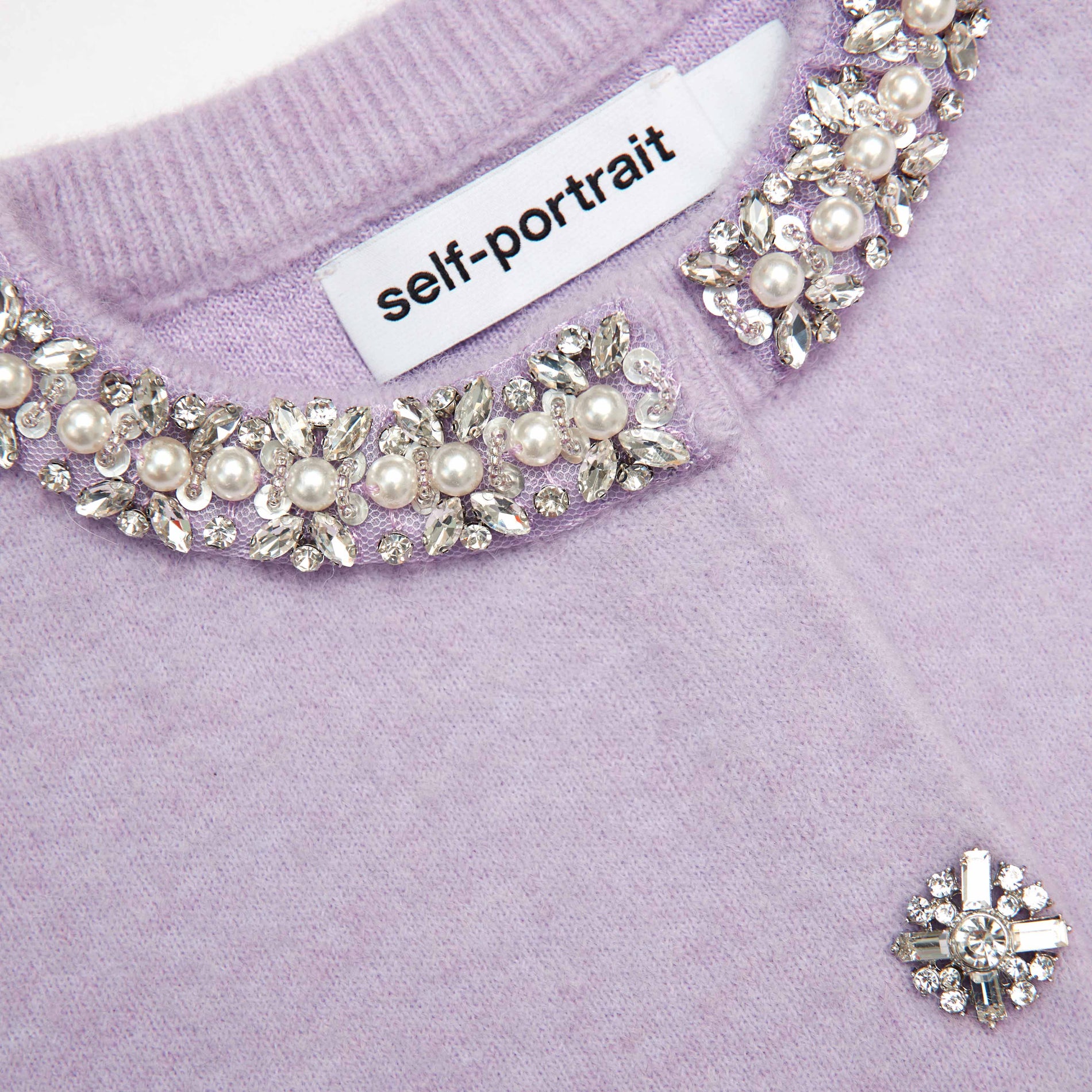 A close up of the fabric for the Lilac Crystal Trim Cardigan