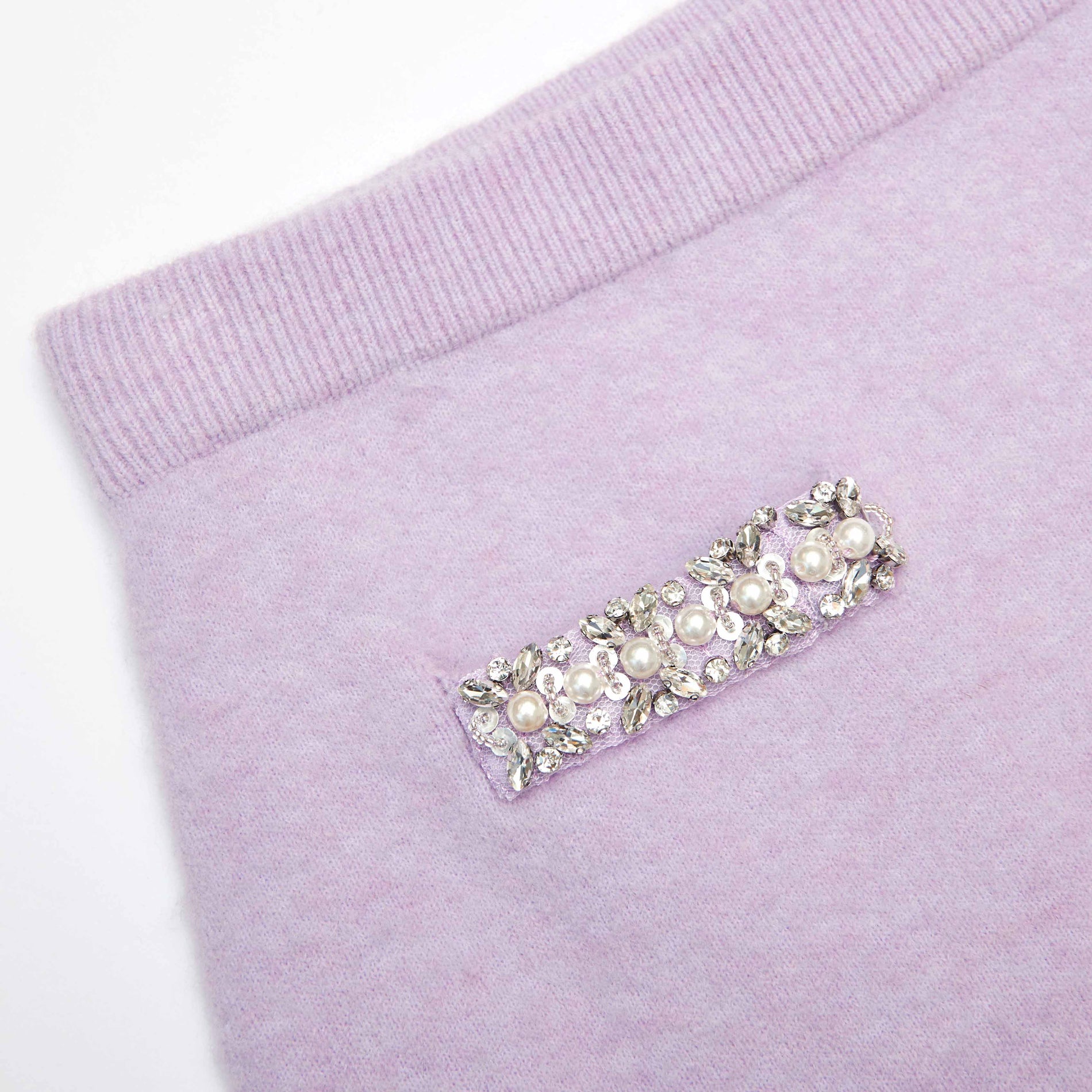A close up of the fabric for the Lilac Crystal Trim Knit Skirt