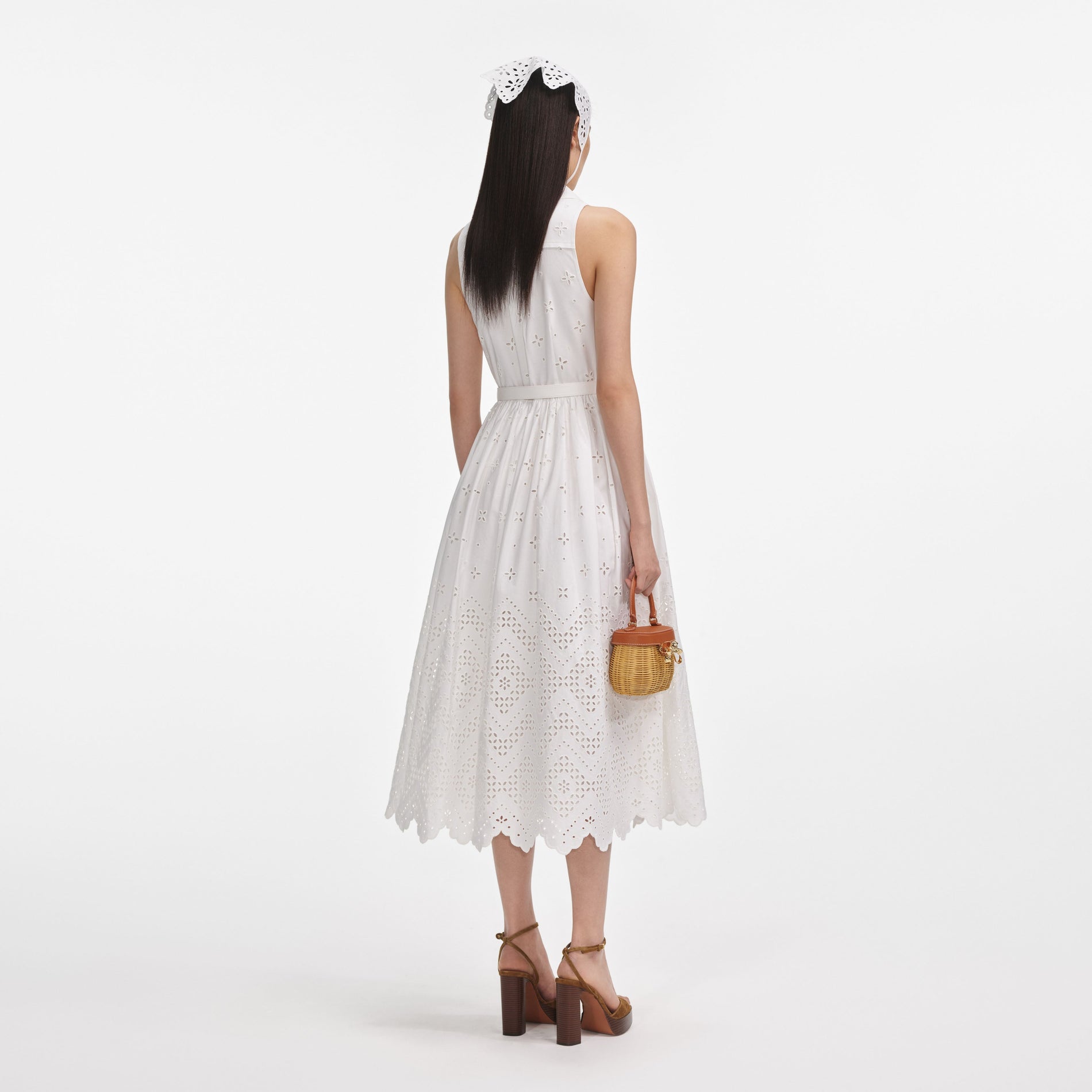 Back view of a woman wearing the White Cotton Broderie Collared Midi Dress