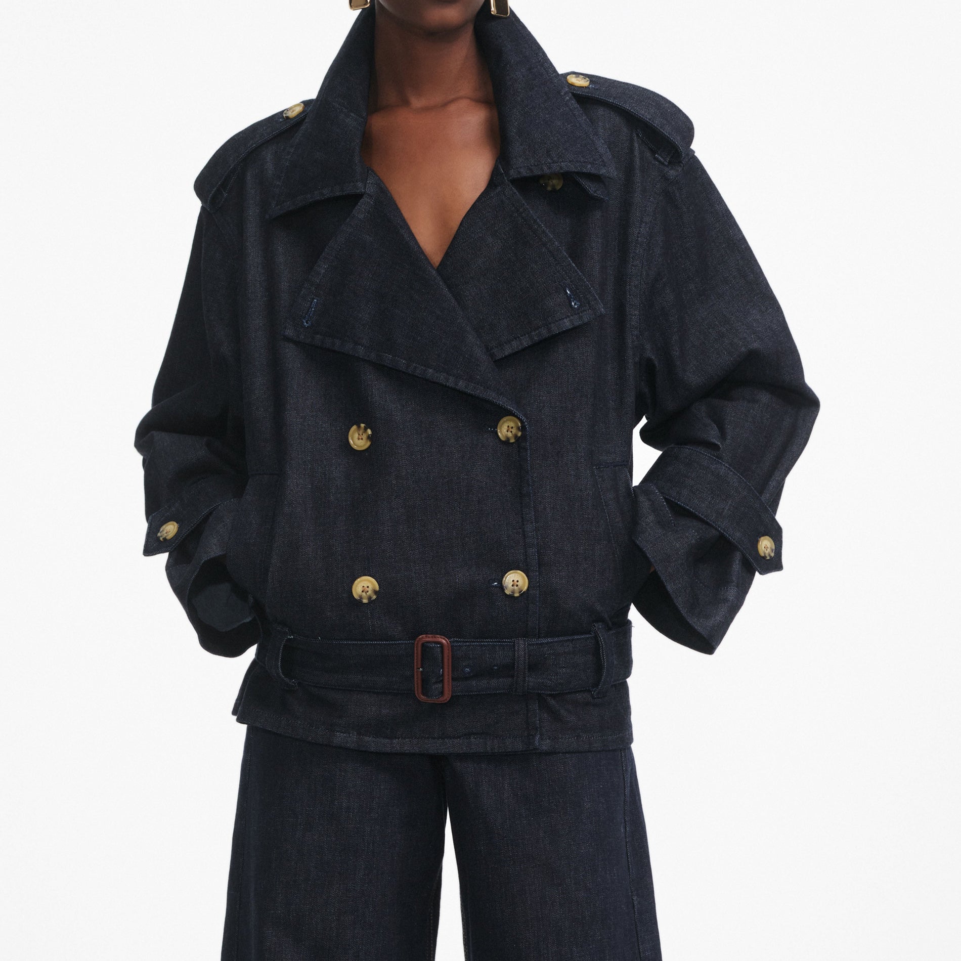 A close up of a woman wearing the Denim Trench Jacket