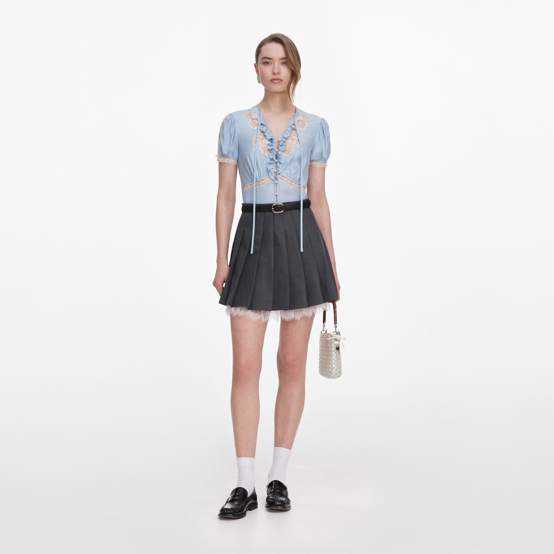 Front view of a woman wearing the Blue Viscose Lace Top